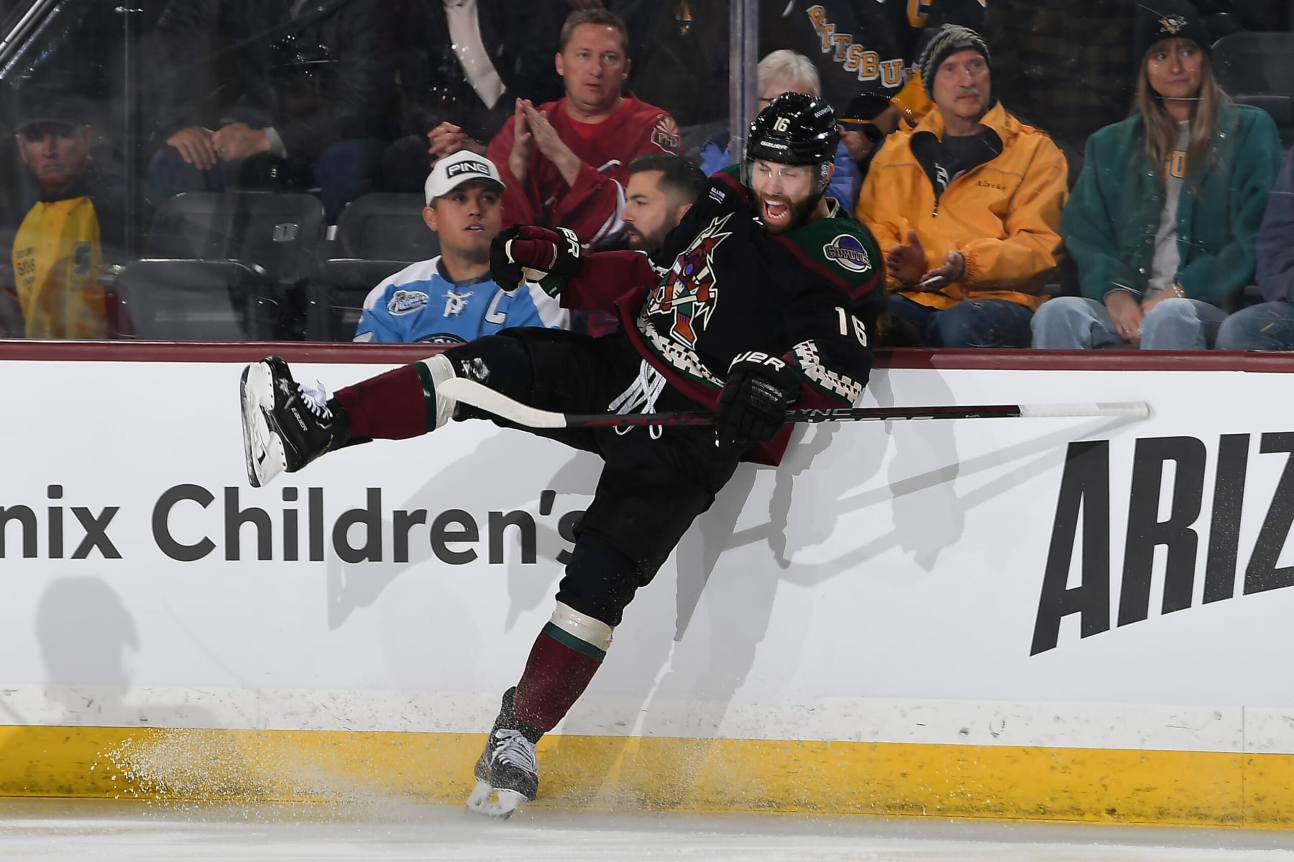 (EDITORS: ALTERNATIVE CROP) TEMPE, ARIZONA - JANUARY 22: Jason Zucker #16 of the Arizona Coyotes celebrates after scoring a goal against the Pittsburgh Penguins during the first period of the game at Mullett Arena on January 22, 2024 in Tempe, Arizona. (Photo by Norm Hall/NHLI via Getty Images)