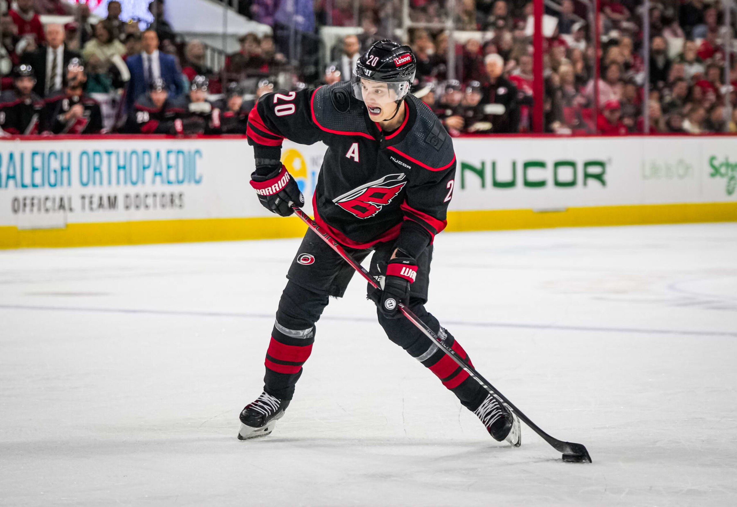 RALEIGH, NORTH CAROLINA - JANUARY 21: Sebastian Aho #20 of the Carolina Hurricanes shoots the puck during the first period against the Minnesota Wild at PNC Arena on January 21, 2024 in Raleigh, North Carolina. (Photo by Josh Lavallee/NHLI via Getty Images)