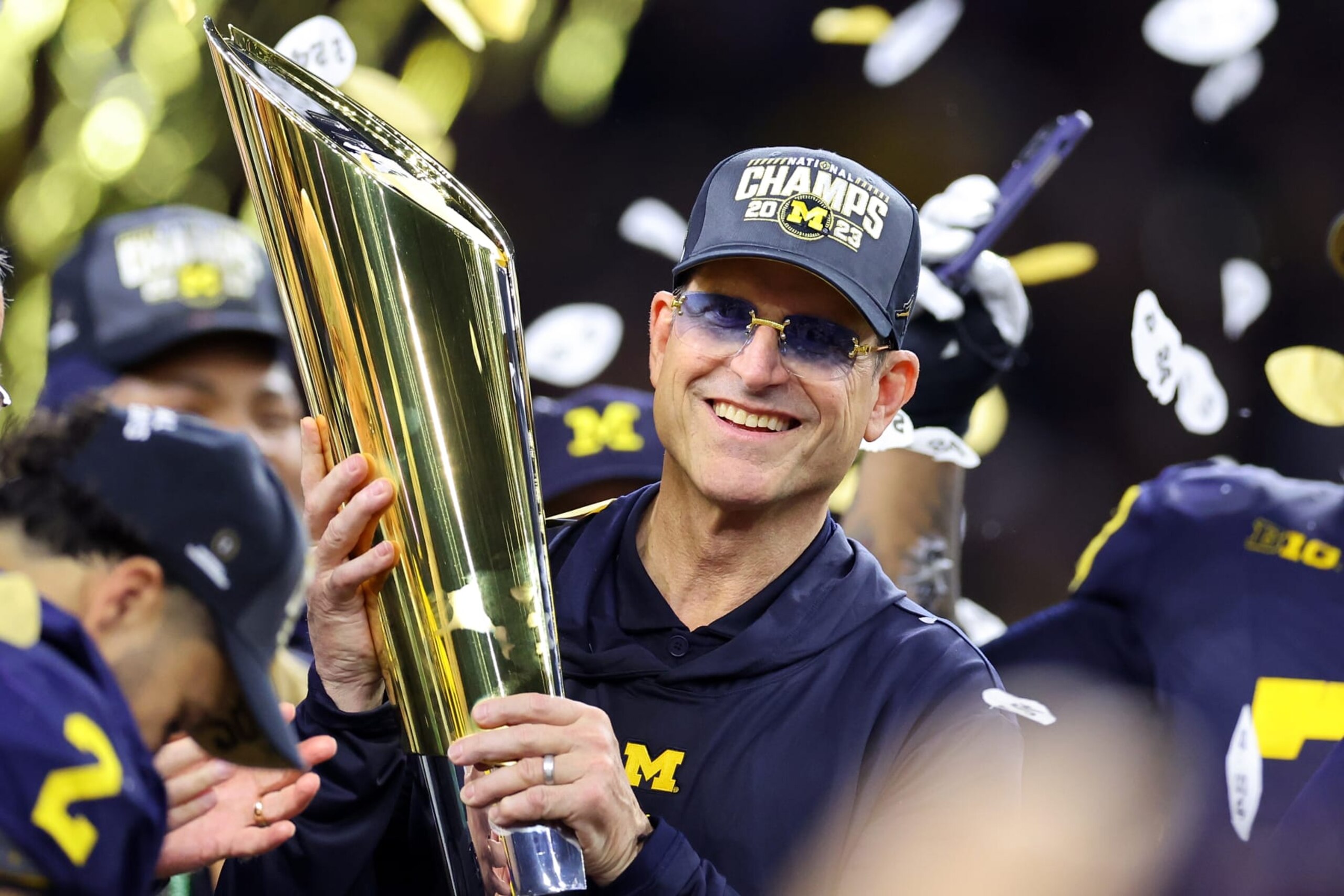 HOUSTON, TEXAS - JANUARY 08: Head coach Jim Harbaugh of the Michigan Wolverines celebrates after defeating the Washington Huskies during the 2024 CFP National Championship game at NRG Stadium on January 08, 2024 in Houston, Texas.  Michigan defeated Washington 34-13. (Photo by Stacy Revere/Getty Images)