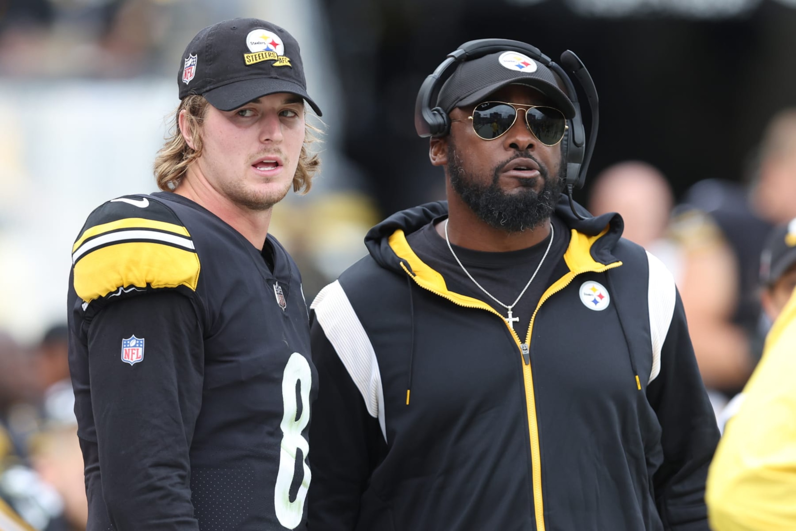 Pittsburgh Steelers quarterback Kenny Pickett (left) and head coach Mike Tomlin (right)