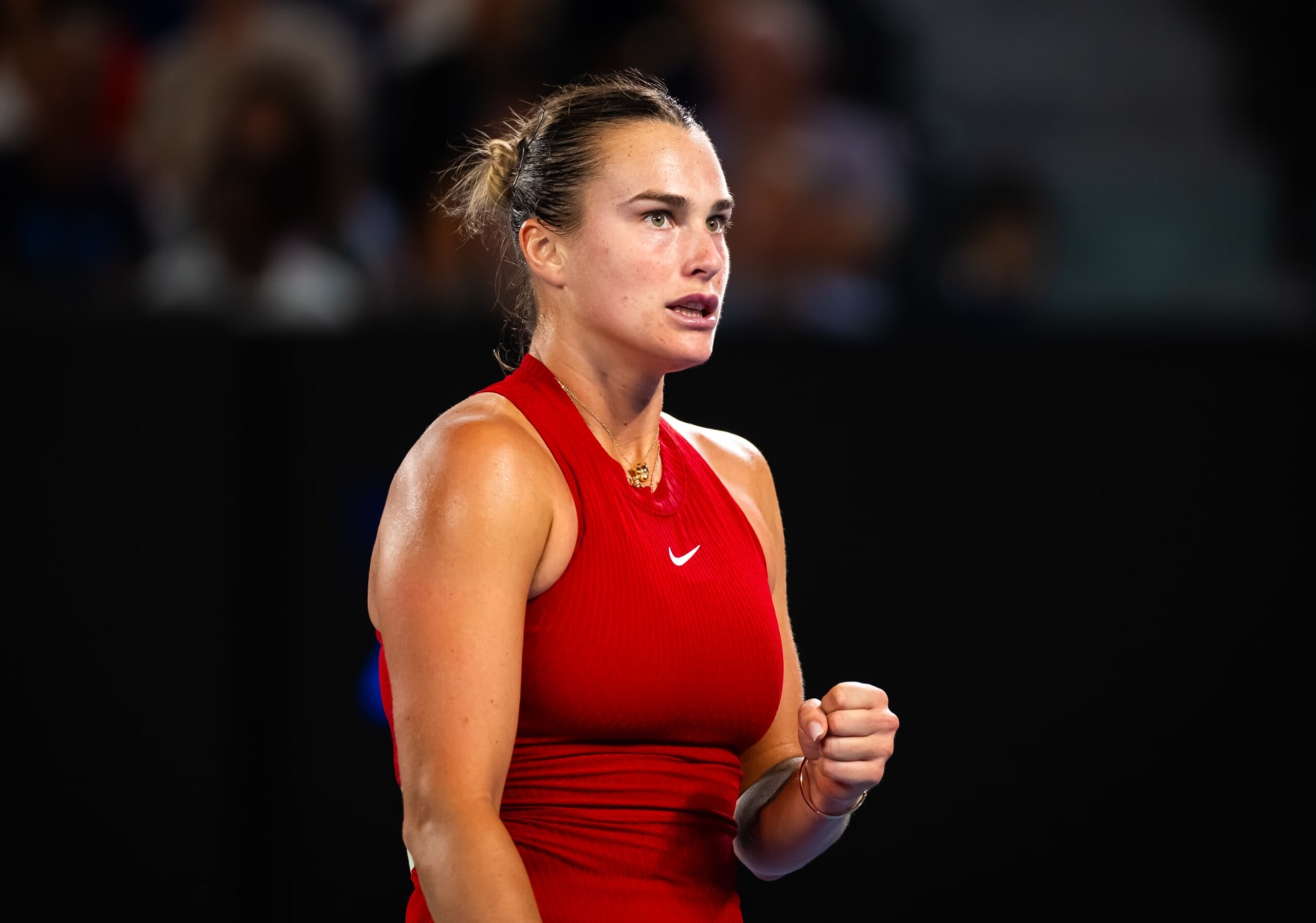 MELBOURNE, AUSTRALIA - JANUARY 25: Aryna Sabalenka in action against Coco Gauff of the United States in the semi-final on Day 12 of the 2024 Australian Open at Melbourne Park on January 25, 2024 in Melbourne, Australia (Photo by Robert Prange/Getty Images)