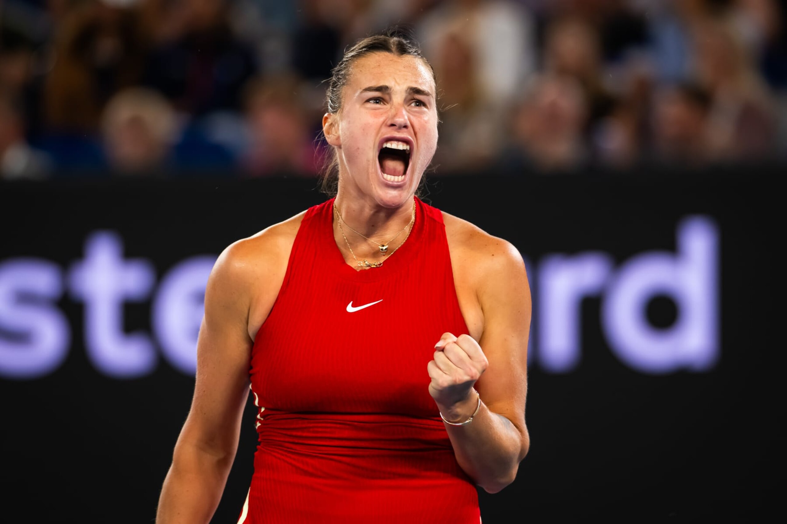 MELBOURNE, AUSTRALIA - JANUARY 25: Aryna Sabalenka in action against Coco Gauff of the United States in the semi-final on Day 12 of the 2024 Australian Open at Melbourne Park on January 25, 2024 in Melbourne, Australia (Photo by Robert Prange/Getty Images)