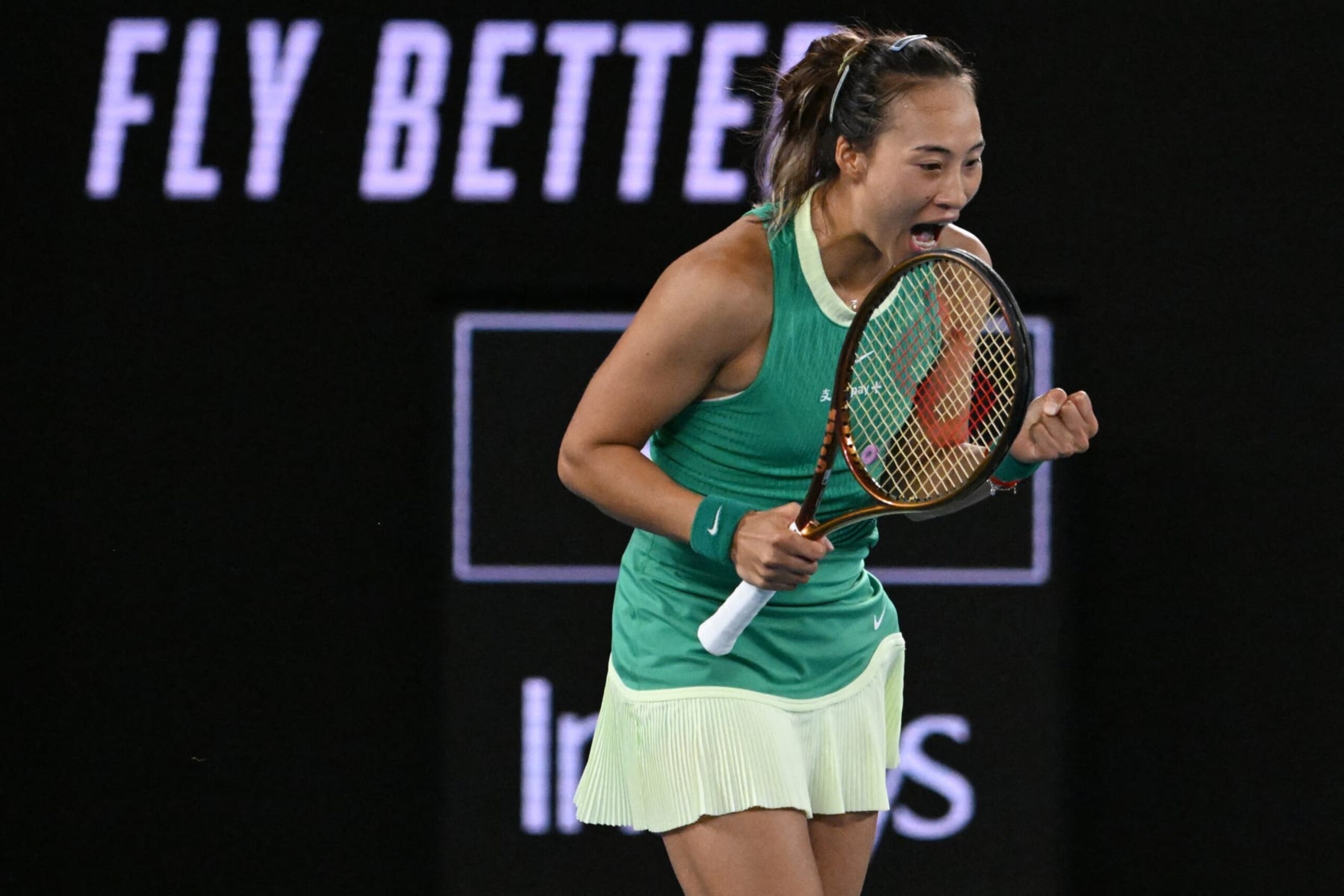 China's Zheng Qinwen celebrates after victory against Ukraine's Dayana Yastremska during their women's singles semi-final match on day 12 of the Australian Open tennis tournament in Melbourne on January 25, 2024. (Photo by WILLIAM WEST / AFP) / -- IMAGE RESTRICTED TO EDITORIAL USE - STRICTLY NO COMMERCIAL USE -- (Photo by WILLIAM WEST/AFP via Getty Images)