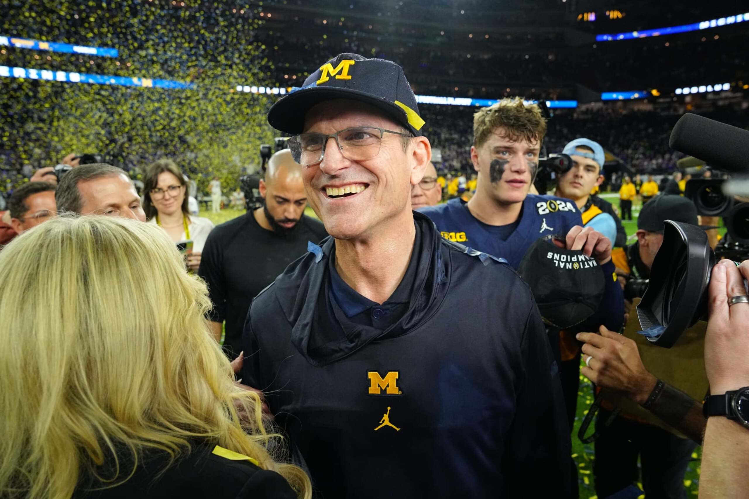 College Football: CFP National Championship: Michigan head coach Jim Harbaugh in action, victorious after the game while being interviewed by ESPN broadcaster Holly Rowe vs Washington at NRG Stadium. 
Houston, TX 1/8/2024
CREDIT: Erick W. Rasco (Photo by Erick W. Rasco/Sports Illustrated via Getty Images) 
(Set Number: X164476 TK1)