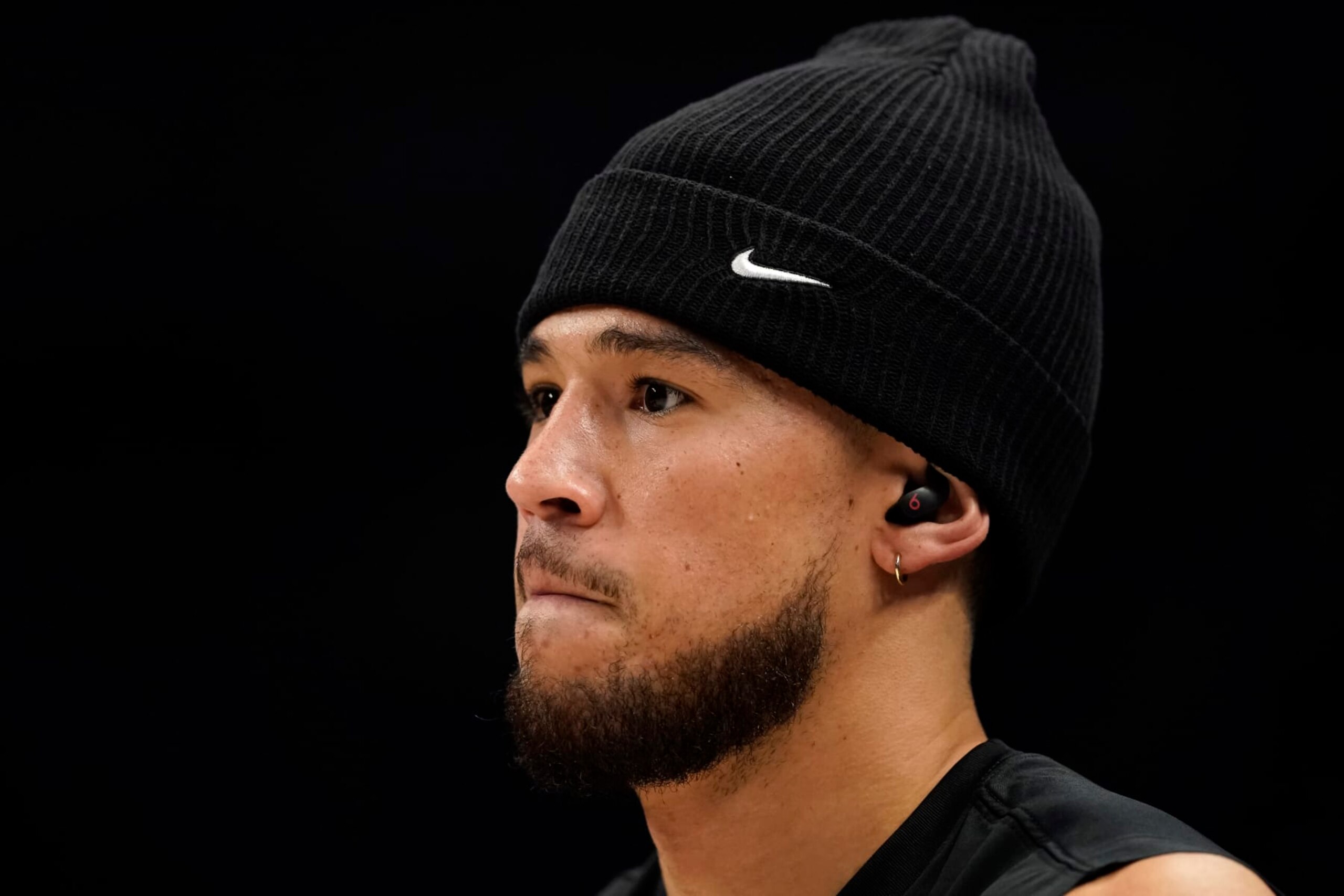 DALLAS, TEXAS - JANUARY 24: Devin Booker #1 of the Phoenix Suns looks on before the game against the Dallas Mavericks at American Airlines Center on January 24, 2024 in Dallas, Texas. NOTE TO USER: User expressly acknowledges and agrees that, by downloading and or using this photograph, User is consenting to the terms and conditions of the Getty Images License Agreement. (Photo by Sam Hodde/Getty Images)