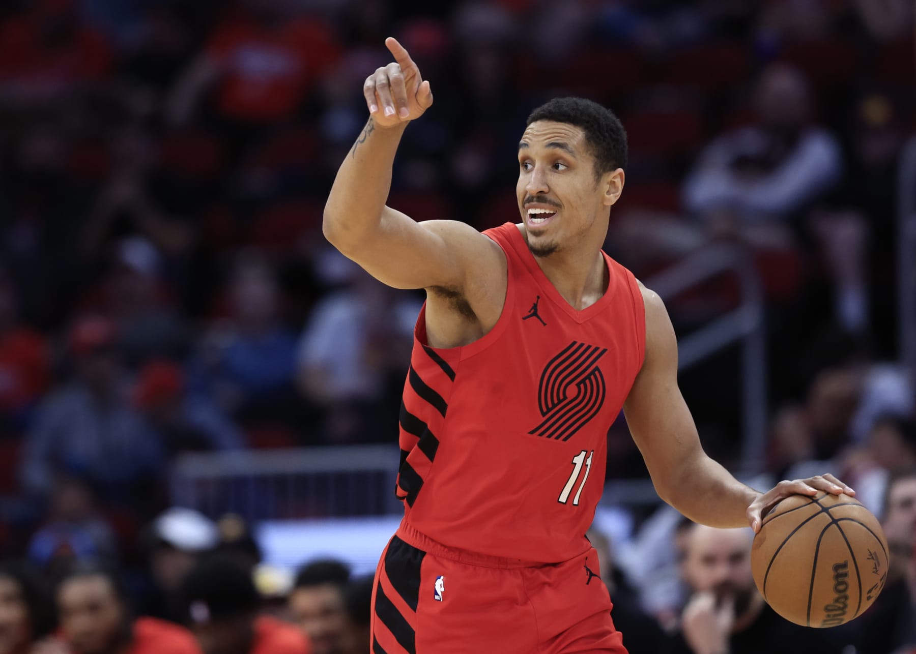 HOUSTON, TEXAS - JANUARY 24: Malcolm Brogdon #11 of the Portland Trail Blazers controls the ball against the Houston Rockets during the first half at Toyota Center on January 24, 2024 in Houston, Texas. (Photo by Carmen Mandato/Getty Images)