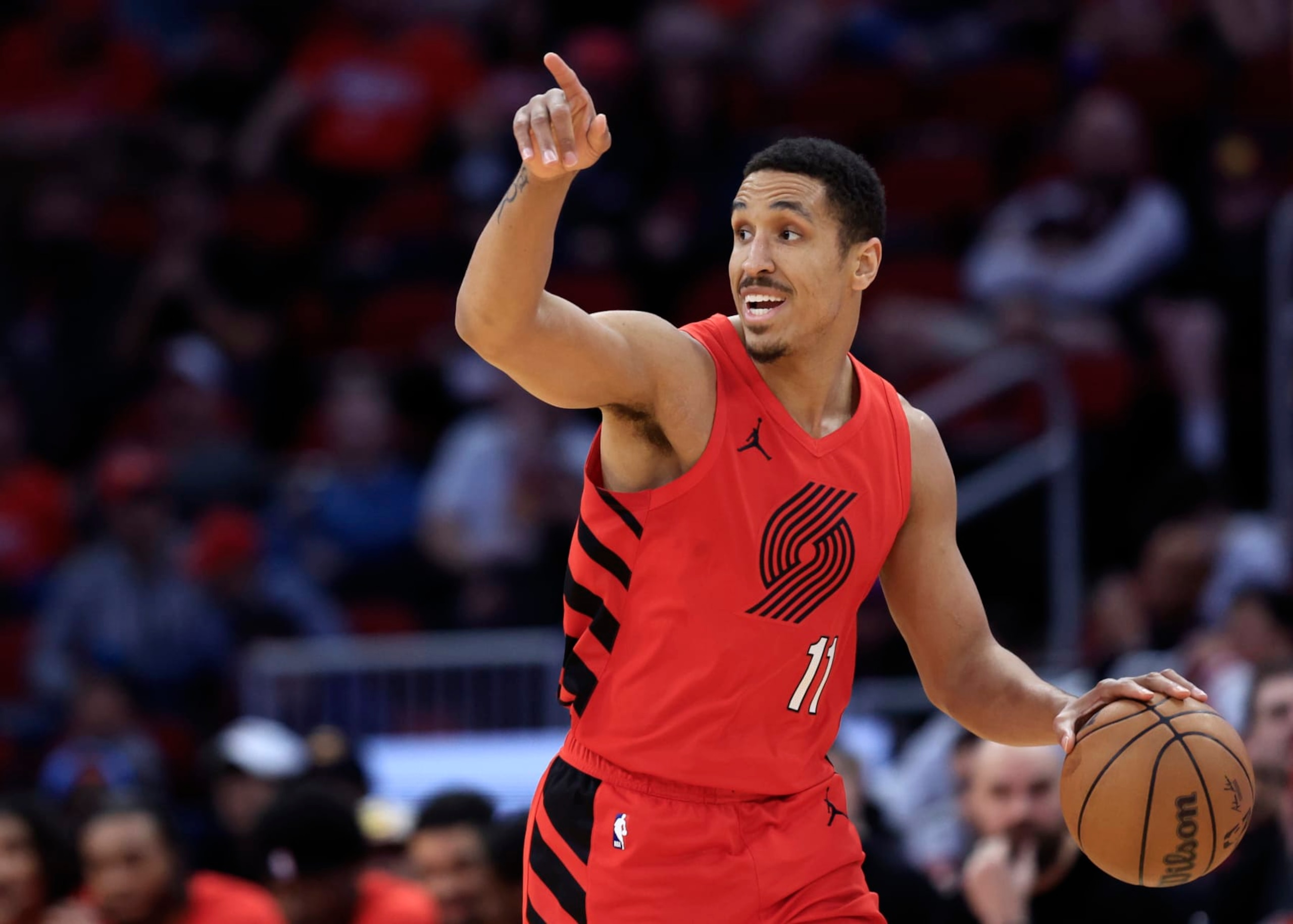 HOUSTON, TEXAS - JANUARY 24: Malcolm Brogdon #11 of the Portland Trail Blazers controls the ball against the Houston Rockets during the first half at Toyota Center on January 24, 2024 in Houston, Texas. (Photo by Carmen Mandato/Getty Images)