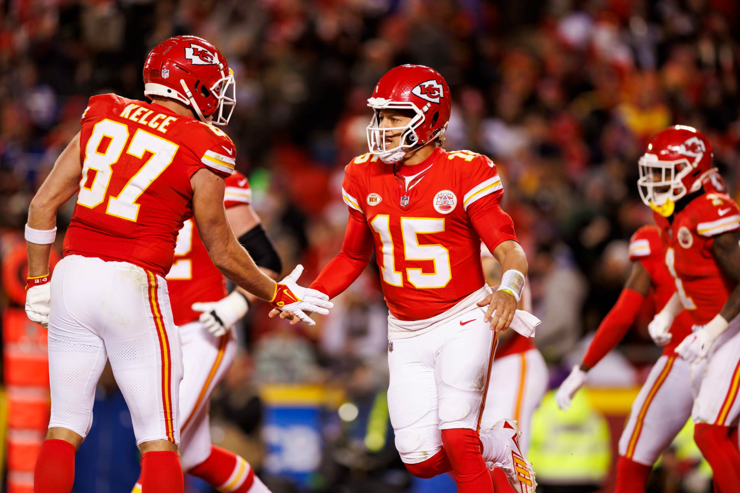 KANSAS CITY, MISSOURI - DECEMBER 10: Patrick Mahomes #15 of the Kansas City Chiefs celebrates with Travis Kelce #87 of the Kansas City Chiefs after the team scored a touchdown during an NFL football game against the Buffalo Bills at GEHA Field at Arrowhead Stadium on December 10, 2023 in Kansas City, Missouri. (Photo by Ryan Kang/Getty Images) KANSAS CITY, MISSOURI - DECEMBER 10: Patrick Mahomes #15 of the Kansas City Chiefs celebrates with Travis Kelce #87 of the Kansas City Chiefs after the team scored a touchdown during an NFL football game against the Buffalo Bills at GEHA Field at Arrowhead Stadium on December 10, 2023 in Kansas City, Missouri. (Photo by Ryan Kang/Getty Images)