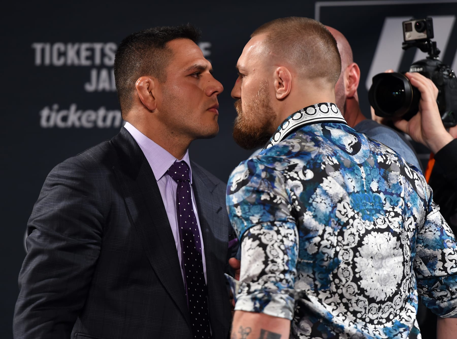 LAS VEGAS, NV - JANUARY 20:  Rafael dos Anjos of Brazil (L) and Conor McGregor of Ireland (R) face off during the UFC 197 on-sale press conference event inside MGM Grand Hotel & Casino on January 20, 2016 in Las Vegas, Nevada. (Photo by Jeff Bottari/Zuffa LLC/Zuffa LLC via Getty Images)