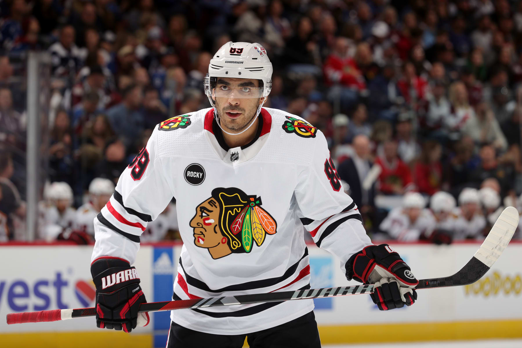 DENVER, COLORADO - OCTOBER 19: Andreas Athanasiou #89 of the Chicago Blackhawks awaits a faceoff during a game against the Colorado Avalanche at Ball Arena on October 19, 2023 in Denver, Colorado. (Photo by Michael Martin/NHLI via Getty Images)