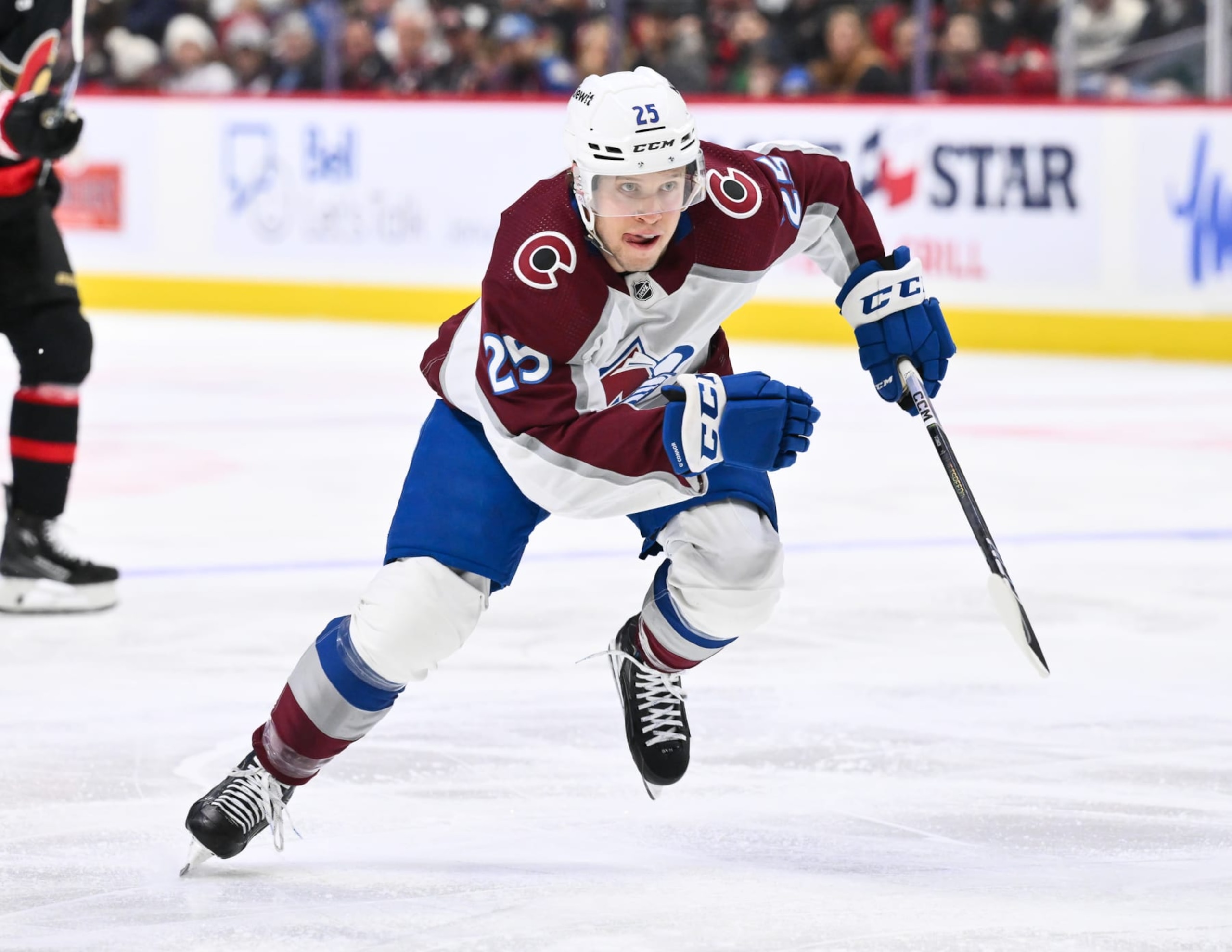 OTTAWA, CANADA - JANUARY 16:  Logan O'Connor #25 of the Colorado Avalanche skates during the third period against the Ottawa Senators at Canadian Tire Centre on January 16, 2024 in Ottawa, Ontario, Canada.  The Colorado Avalanche defeated the Ottawa Senators 7-4.  (Photo by Minas Panagiotakis/Getty Images)