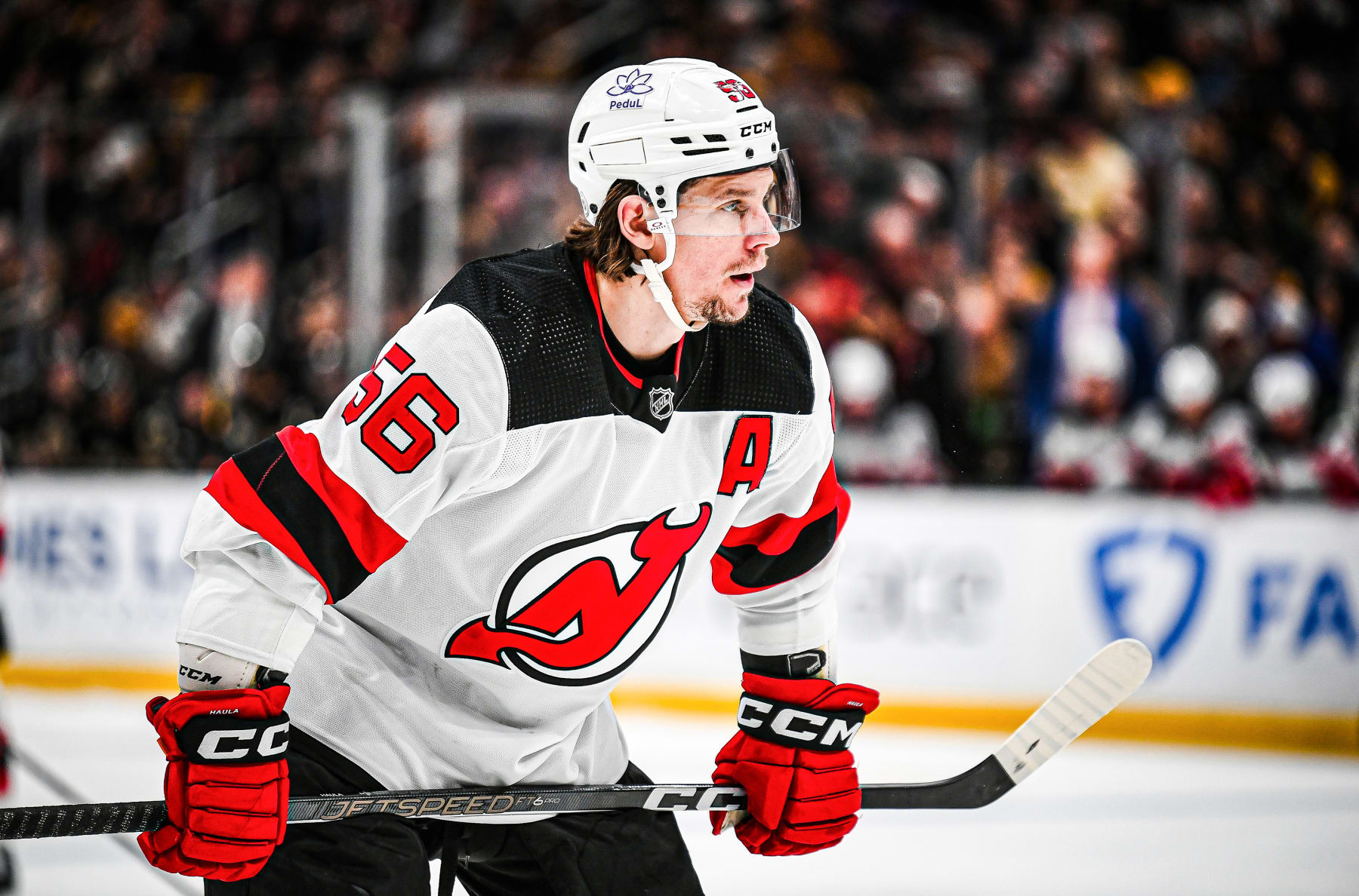 BOSTON, MASSACHUSETTS - JANUARY 15: Erik Haula #56 of the New Jersey Devils prepares for a face-off against the Boston Bruins during the second period at TD Garden on January 15, 2024 in Boston, Massachusetts. (Photo by China Wong/NHLI via Getty Images)