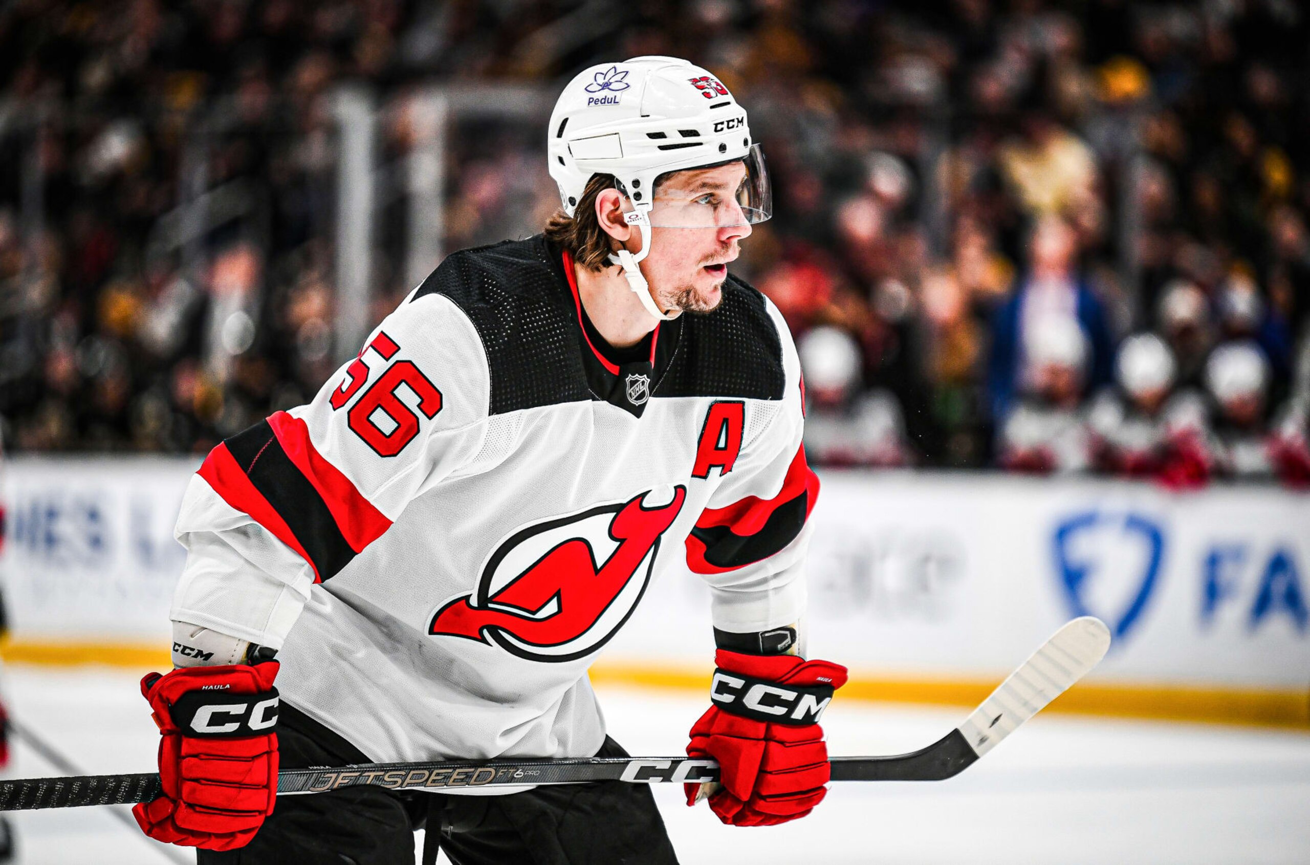 BOSTON, MASSACHUSETTS - JANUARY 15: Erik Haula #56 of the New Jersey Devils prepares for a face-off against the Boston Bruins during the second period at TD Garden on January 15, 2024 in Boston, Massachusetts. (Photo by China Wong/NHLI via Getty Images)