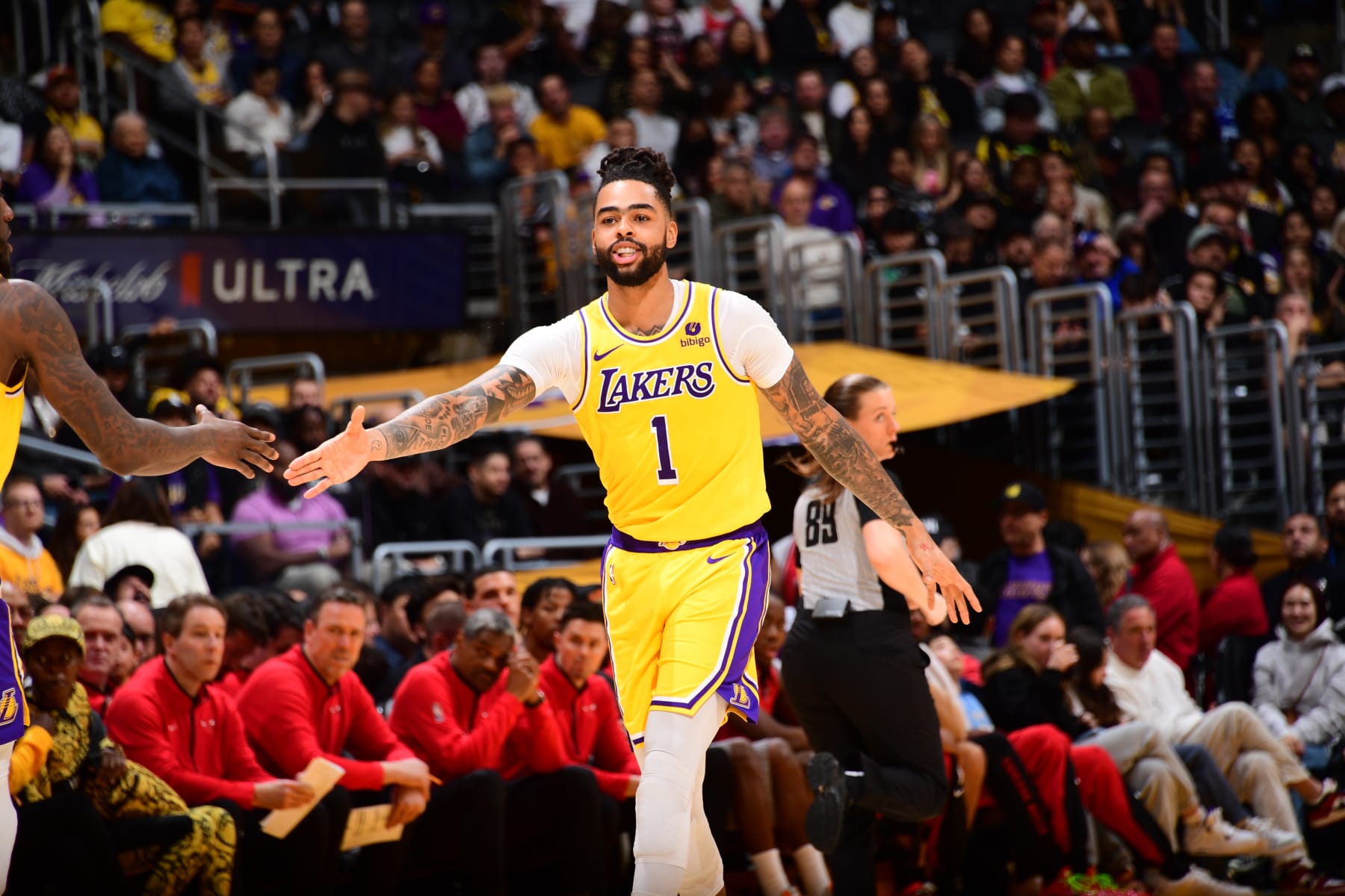 LOS ANGELES, CA - JANUARY 25: D'Angelo Russell #1 of the Los Angeles Lakers smiles during the game against the Chicago Bulls on January 25, 2024 at Crypto.Com Arena in Los Angeles, California. NOTE TO USER: User expressly acknowledges and agrees that, by downloading and/or using this Photograph, user is consenting to the terms and conditions of the Getty Images License Agreement. Mandatory Copyright Notice: Copyright 2024 NBAE (Photo by Adam Pantozzi/NBAE via Getty Images)