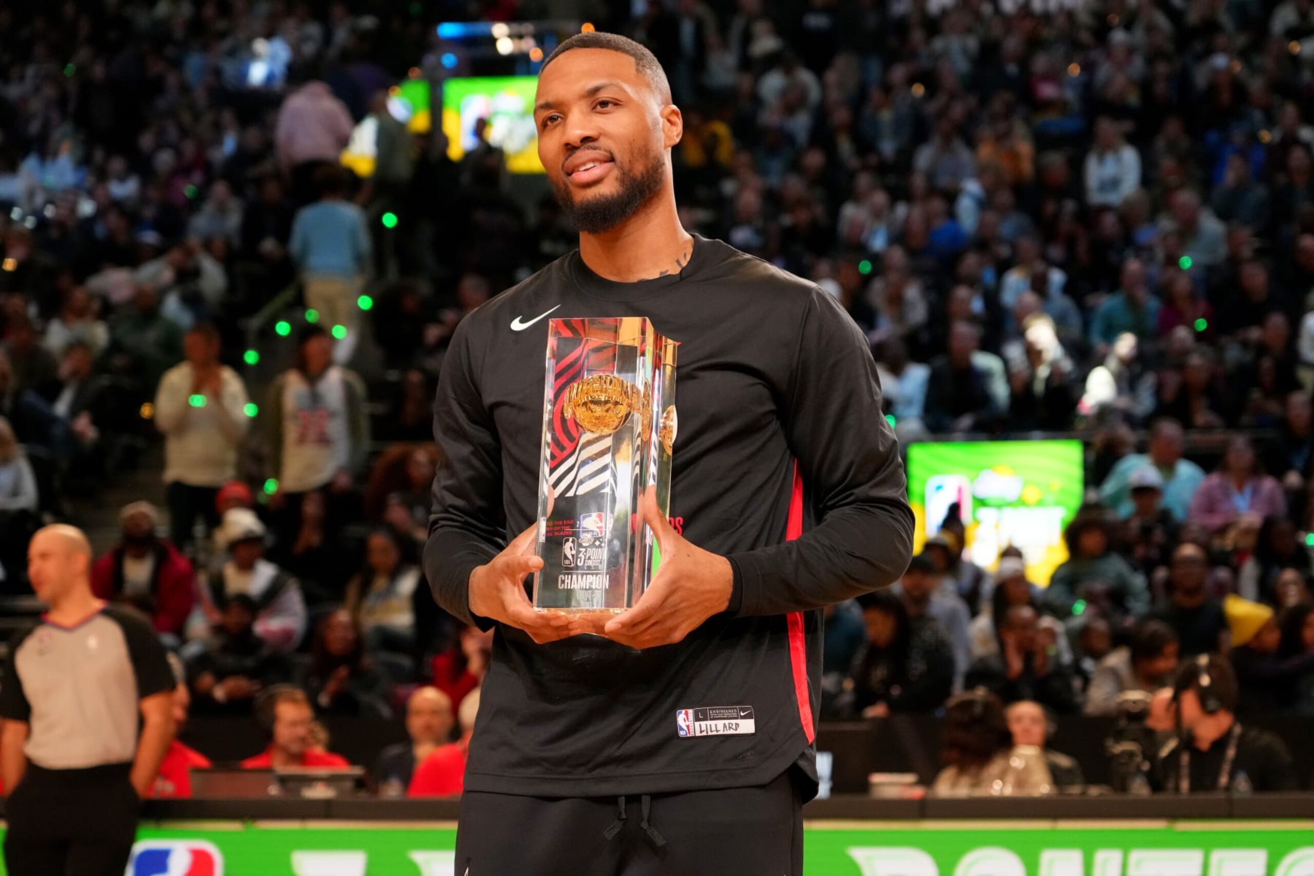 SALT LAKE CITY, UT - FEBRUARY 18: Damian Lillard #0 of the Portland Trail Blazers poses for a portrait with the  Starry 3-Point Contest trophy as part of 2023 NBA All Star Weekend on Saturday, February 18, 2023 at Vivint Arena in Salt Lake City, Utah. NOTE TO USER: User expressly acknowledges and agrees that, by downloading and/or using this Photograph, user is consenting to the terms and conditions of the Getty Images License Agreement. Mandatory Copyright Notice: Copyright 2023 NBAE (Photo by Jesse D. Garrabrant/NBAE via Getty Images)