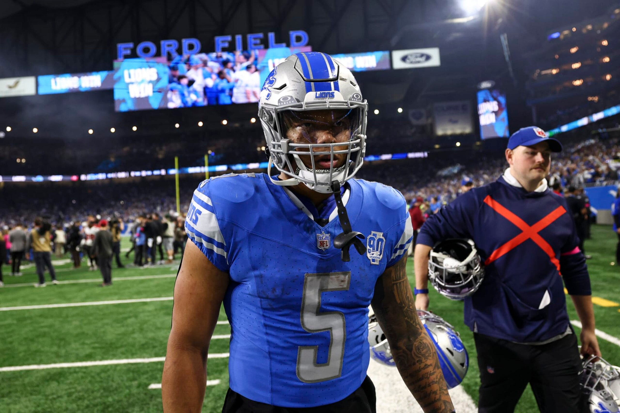 DETROIT, MI - JANUARY 21: David Montgomery #5 of the Detroit Lions walks to the tunnel after an NFL divisional round playoff football game against the Tampa Bay Buccaneers at Ford Field on January 21, 2024 in Detroit, Michigan. (Photo by Kevin Sabitus/Getty Images)