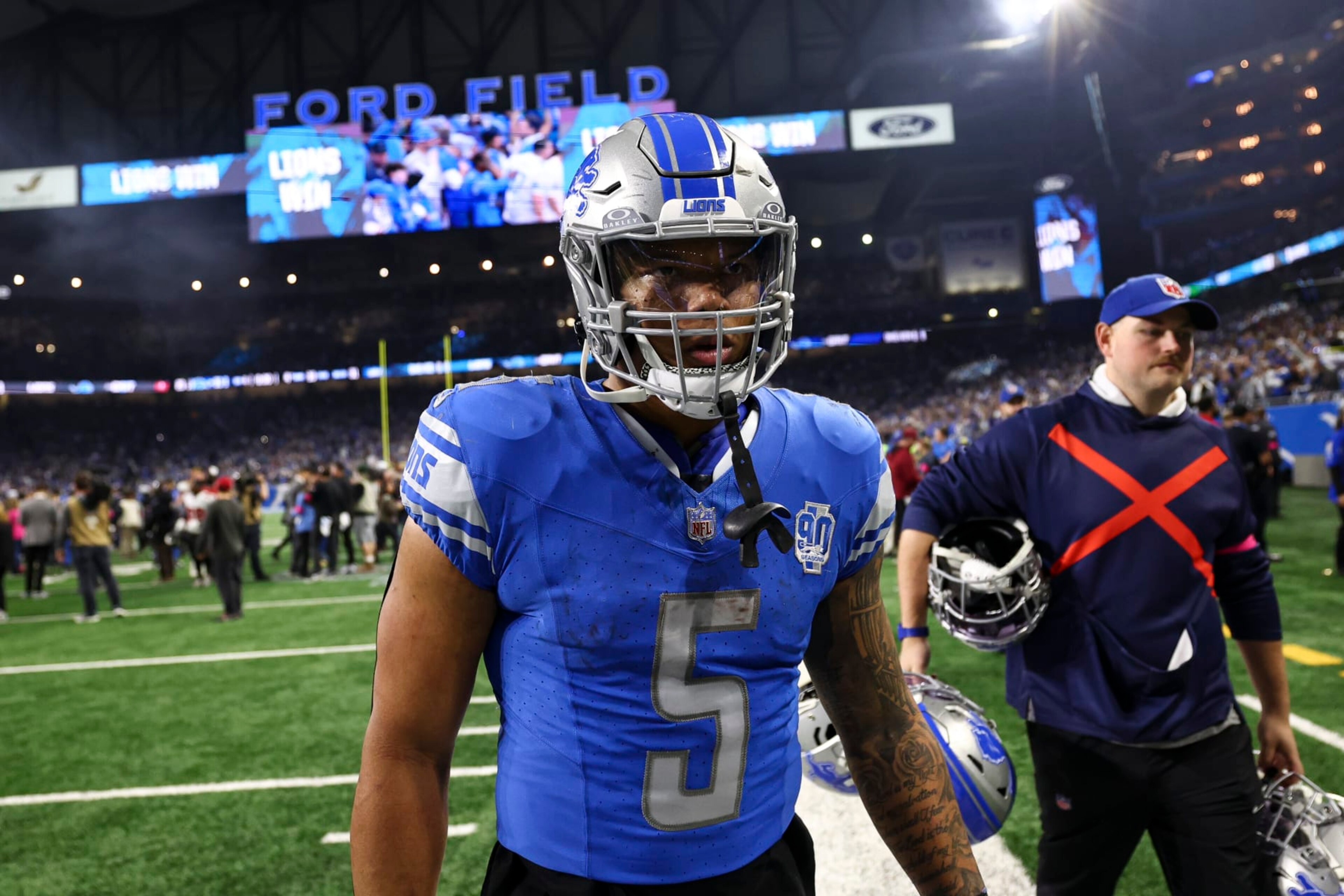 DETROIT, MI - JANUARY 21: David Montgomery #5 of the Detroit Lions walks to the tunnel after an NFL divisional round playoff football game against the Tampa Bay Buccaneers at Ford Field on January 21, 2024 in Detroit, Michigan. (Photo by Kevin Sabitus/Getty Images)