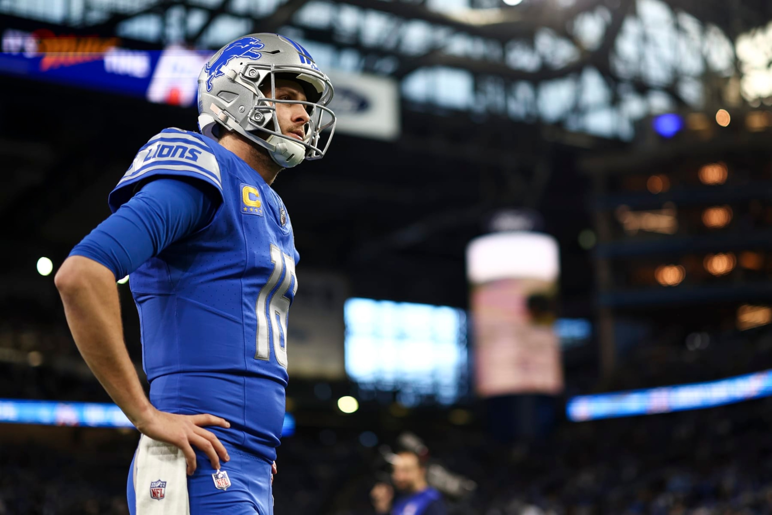 DETROIT, MI - JANUARY 21: Jared Goff #16 of the Detroit Lions looks on prior to an NFL divisional round playoff football game against the Tampa Bay Buccaneers at Ford Field on January 21, 2024 in Detroit, Michigan. (Photo by Kevin Sabitus/Getty Images)
