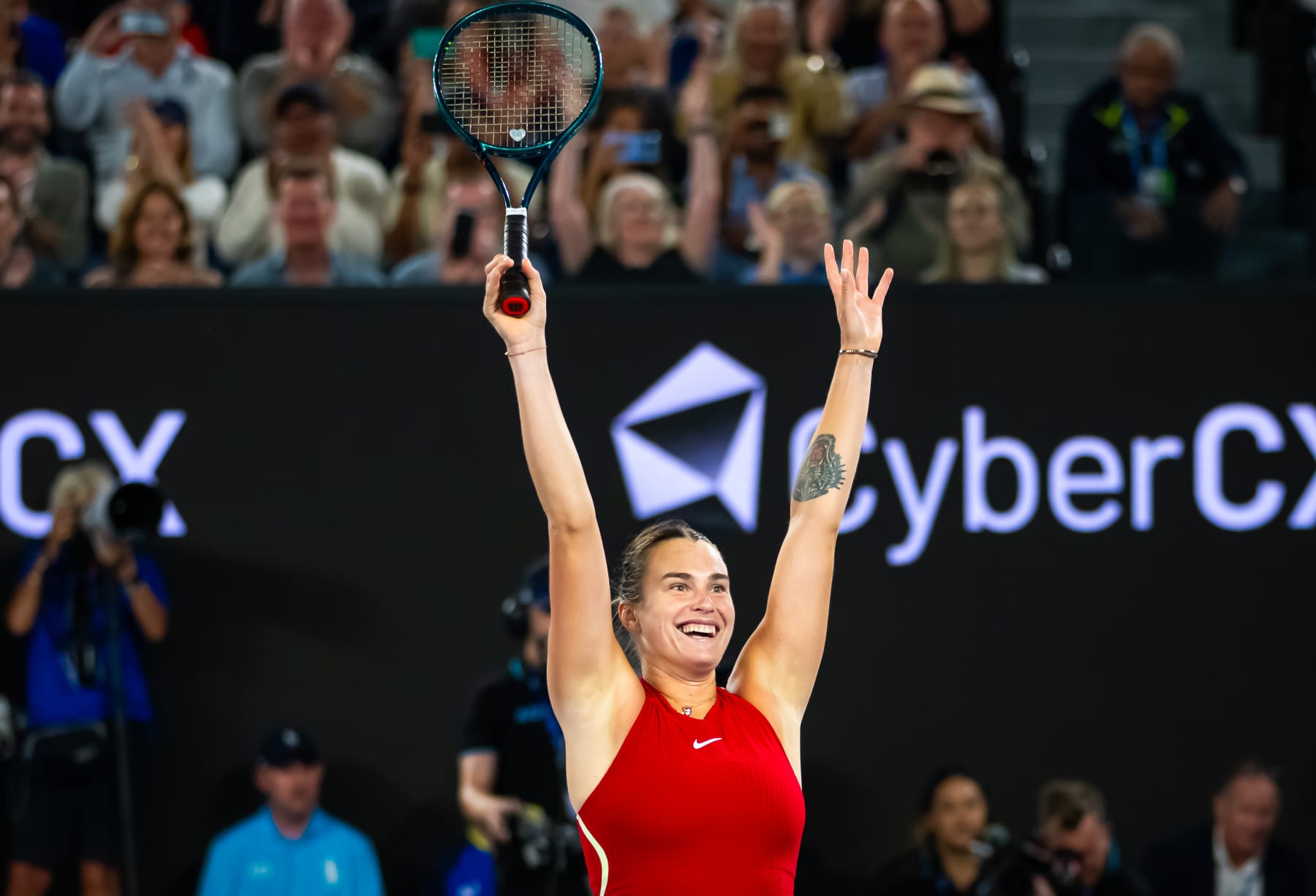 MELBOURNE, AUSTRALIA - JANUARY 27: Aryna Sabalenka reacts to defeating Qinwen Zheng of China in the womens singles final on Day 14 of the 2024 Australian Open at Melbourne Park on January 27, 2024 in Melbourne, Australia (Photo by Robert Prange/Getty Images)