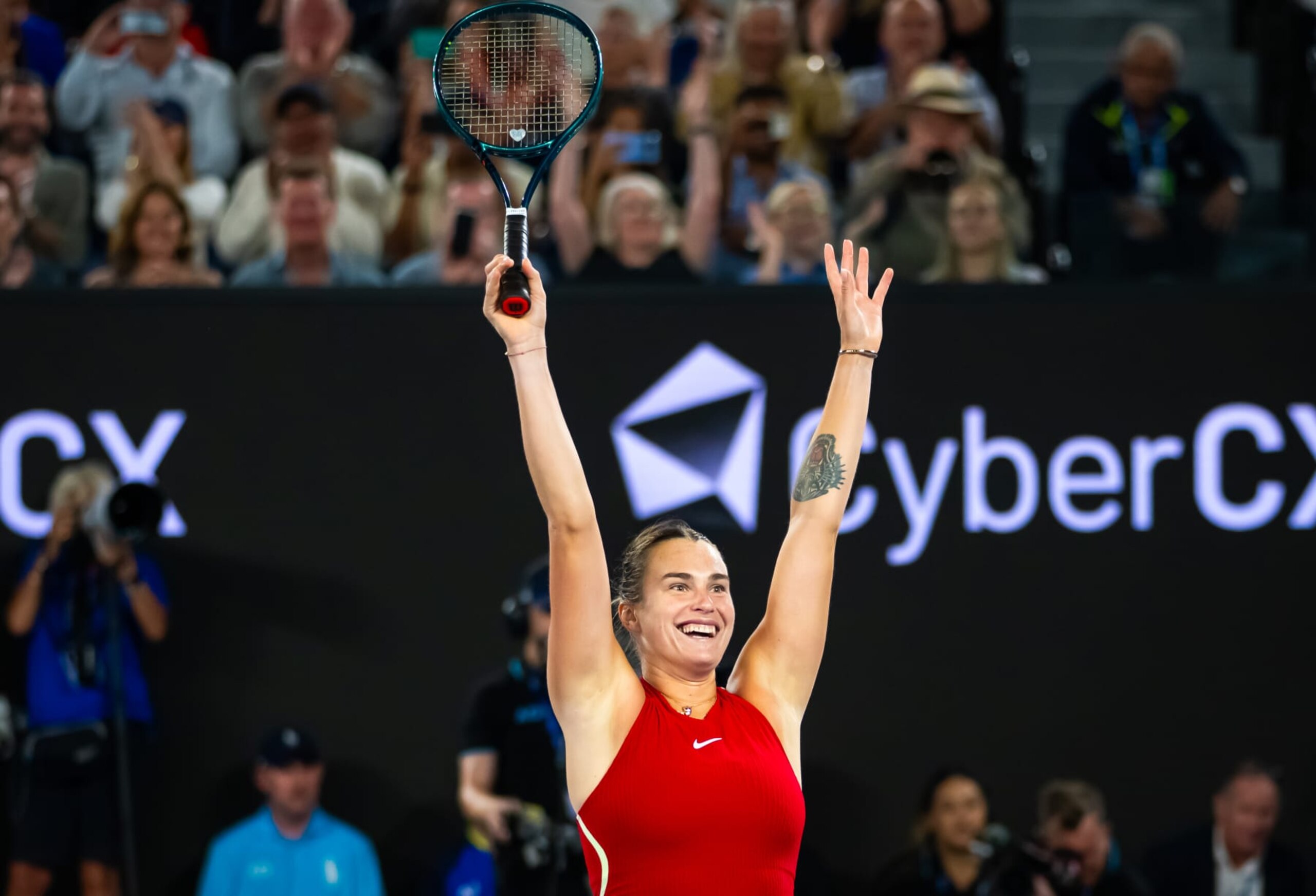 MELBOURNE, AUSTRALIA - JANUARY 27: Aryna Sabalenka reacts to defeating Qinwen Zheng of China in the womens singles final on Day 14 of the 2024 Australian Open at Melbourne Park on January 27, 2024 in Melbourne, Australia (Photo by Robert Prange/Getty Images)
