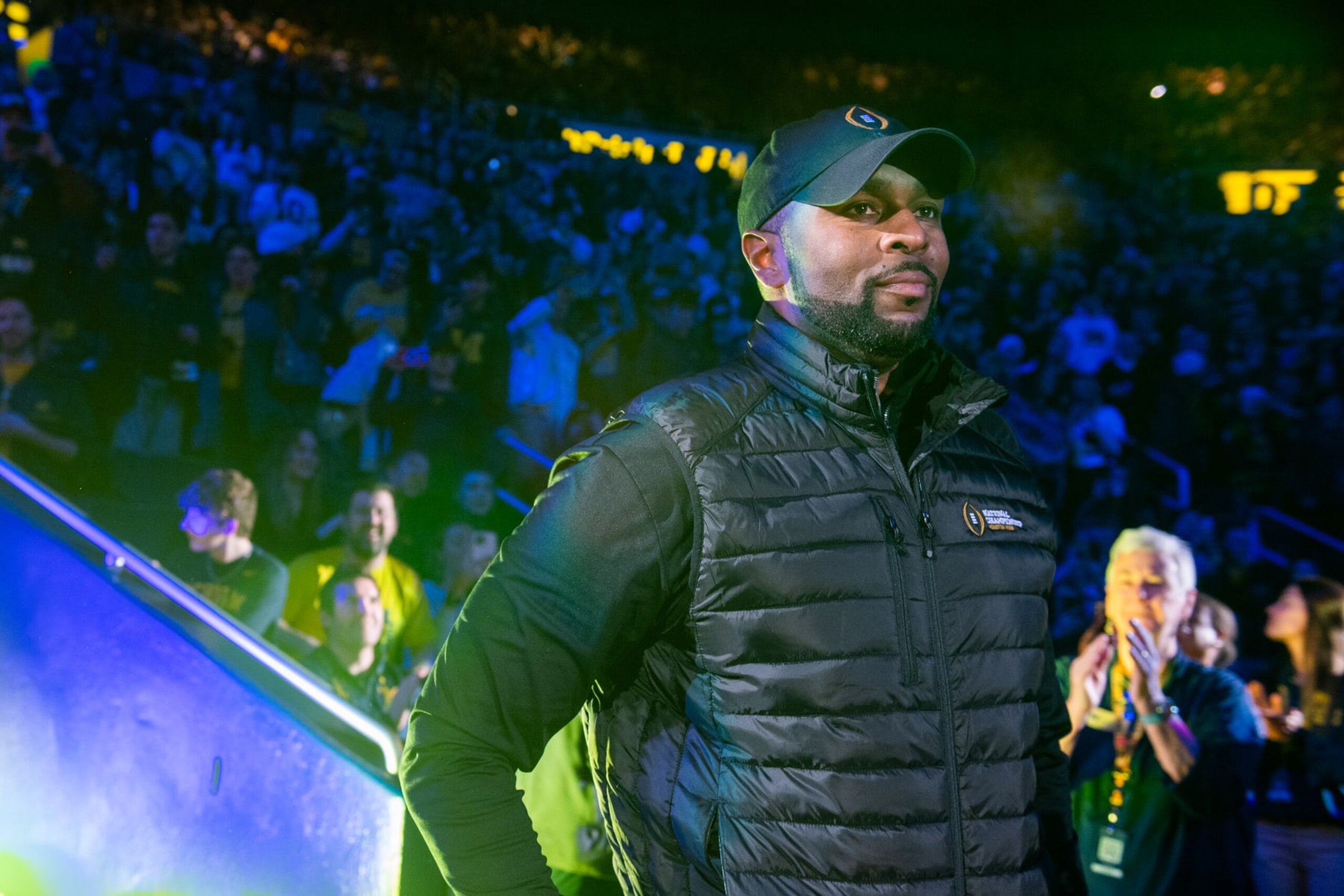 ANN ARBOR, MICHIGAN - JANUARY 13: Offensive Coordinator Sherrone Moore of the Michigan Wolverines walks out the tunnel before the National Championship Celebration at Crisler Center on January 13, 2024 in Ann Arbor, Michigan. (Photo by Aaron J. Thornton/Getty Images)