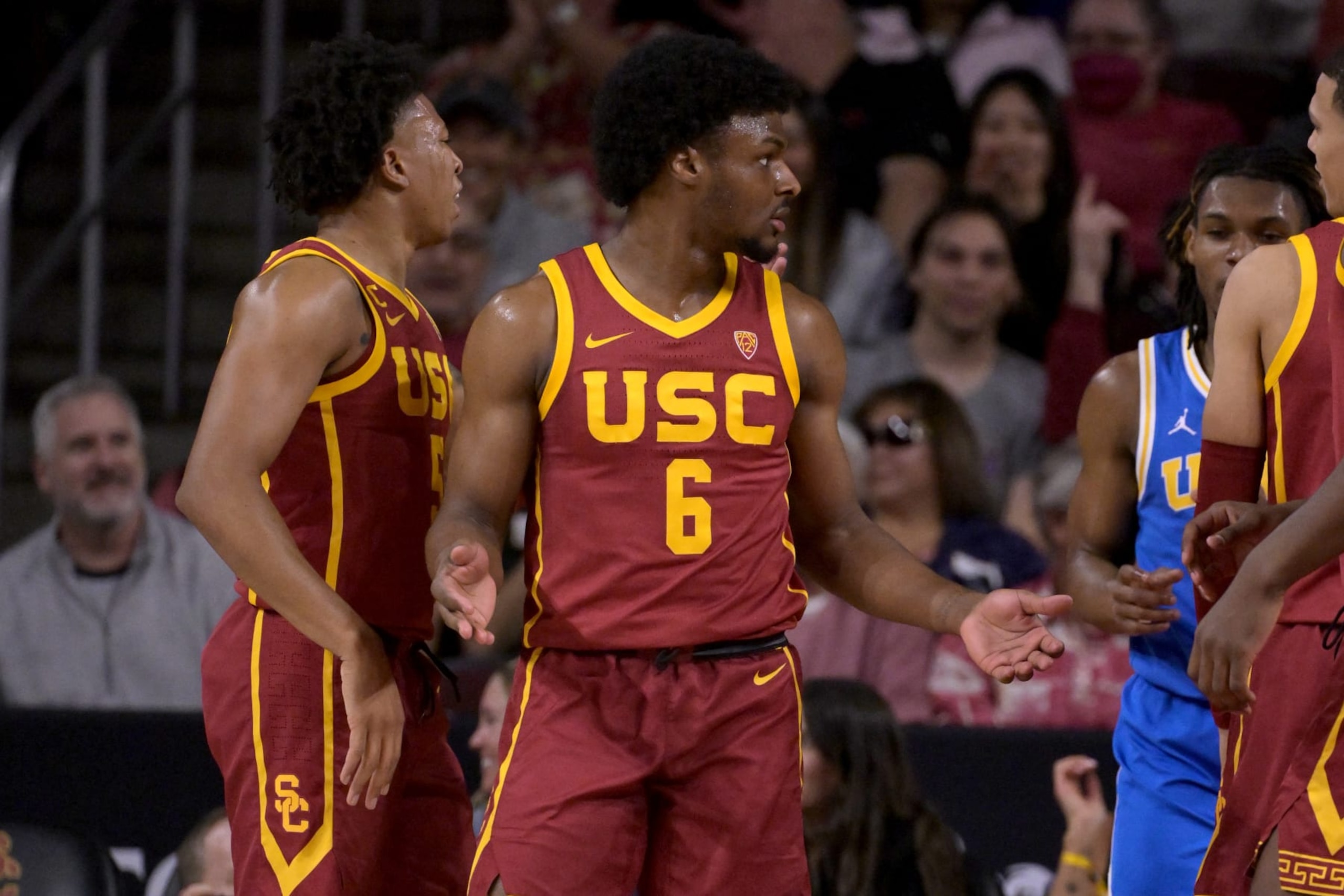 LOS ANGELES, CALIFORNIA - JANUARY 27: Bronny James #6 of the USC Trojans reacts after blocking a shot by Dylan Andrews #2 of the UCLA Bruins in the first half at Galen Center on January 27, 2024 in Los Angeles, California. (Photo by Jayne Kamin-Oncea/Getty Images) LOS ANGELES, CALIFORNIA - JANUARY 27: Bronny James #6 of the USC Trojans reacts after blocking a shot by Dylan Andrews #2 of the UCLA Bruins in the first half at Galen Center on January 27, 2024 in Los Angeles, California. (Photo by Jayne Kamin-Oncea/Getty Images)