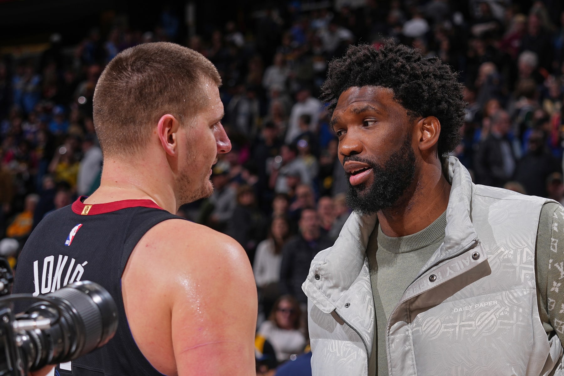 DENVER, CO - JANUARY 27: Joel Embiid #21 of the Philadelphia 76ers and Nikola Jokic #15 of the Denver Nuggets embrace after the game on January 27, 2024 at the Ball Arena in Denver, Colorado. NOTE TO USER: User expressly acknowledges and agrees that, by downloading and/or using this Photograph, user is consenting to the terms and conditions of the Getty Images License Agreement. Mandatory Copyright Notice: Copyright 2024 NBAE (Photo by Bart Young/NBAE via Getty Images)