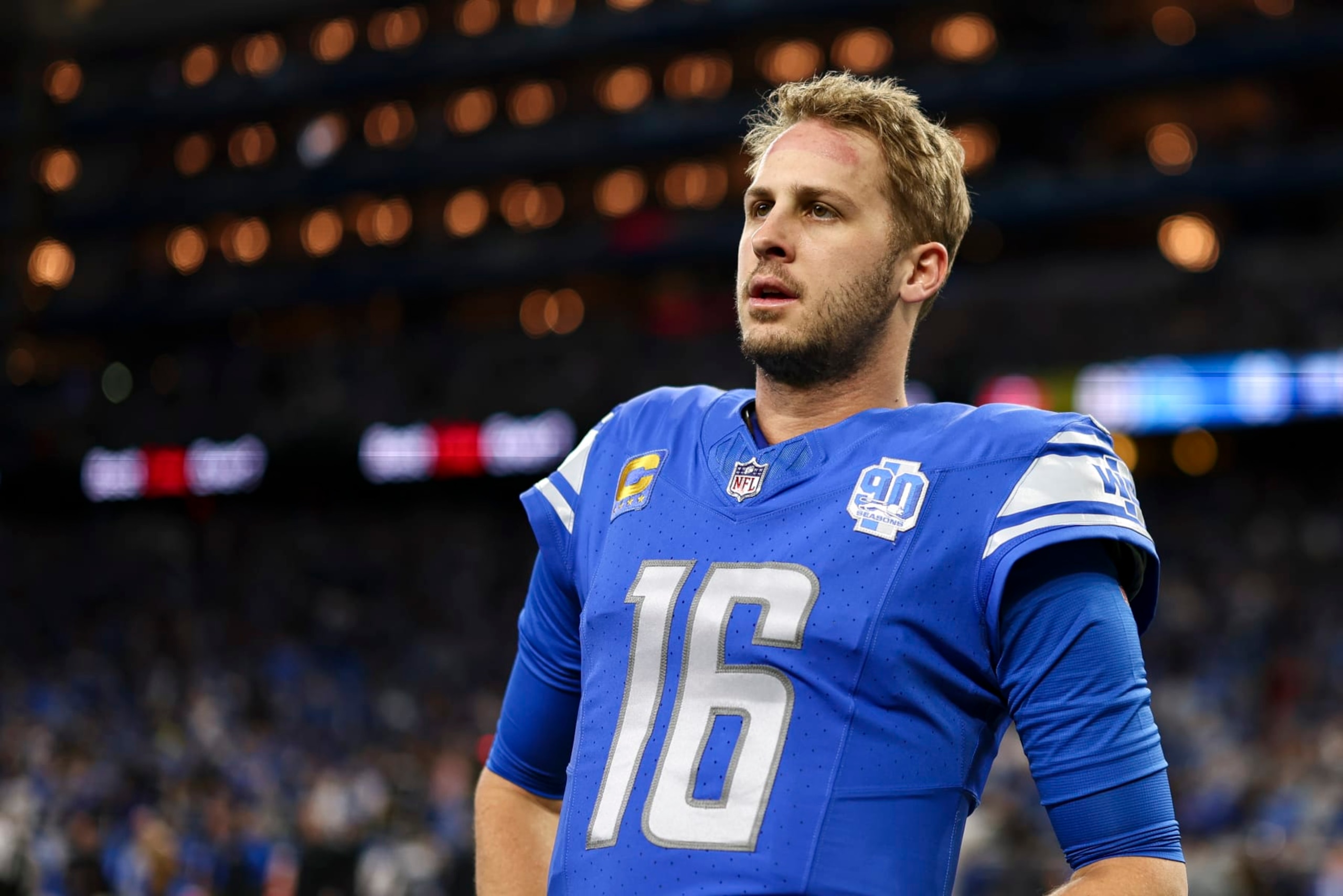 DETROIT, MI - JANUARY 21: Jared Goff #16 of the Detroit Lions stretches prior to an NFL divisional round playoff football game against the Tampa Bay Buccaneers at Ford Field on January 21, 2024 in Detroit, Michigan. (Photo by Kevin Sabitus/Getty Images)
