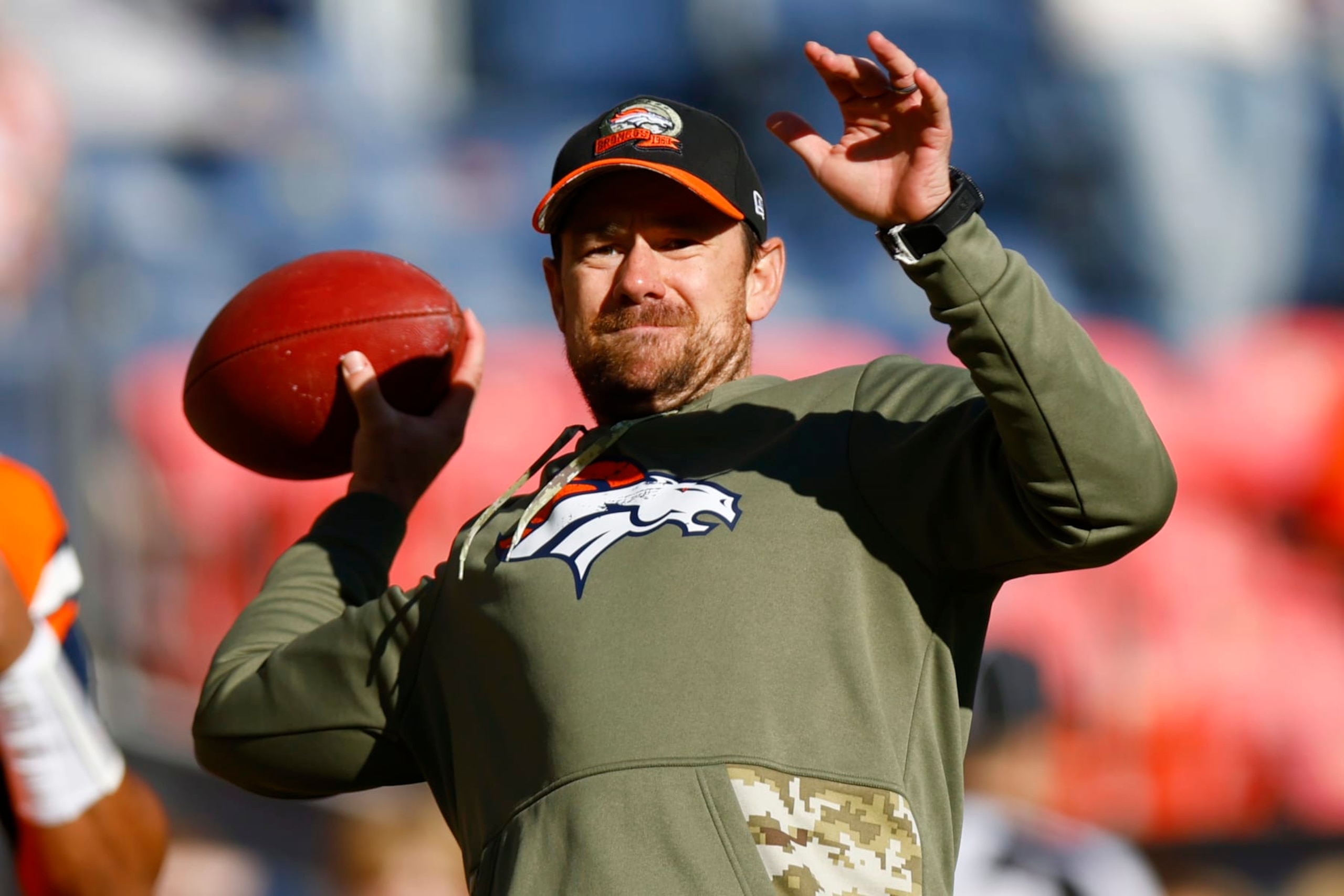 DENVER, COLORADO - NOVEMBER 20: Klint Kubiak quarterbacks coach for the Denver Broncos throws a pass during warmups prior to a game against the Las Vegas Raiders at Empower Field At Mile High on November 20, 2022 in Denver, Colorado. (Photo by Justin Edmonds/Getty Images) DENVER, COLORADO - NOVEMBER 20: Klint Kubiak quarterbacks coach for the Denver Broncos throws a pass during warmups prior to a game against the Las Vegas Raiders at Empower Field At Mile High on November 20, 2022 in Denver, Colorado. (Photo by Justin Edmonds/Getty Images)