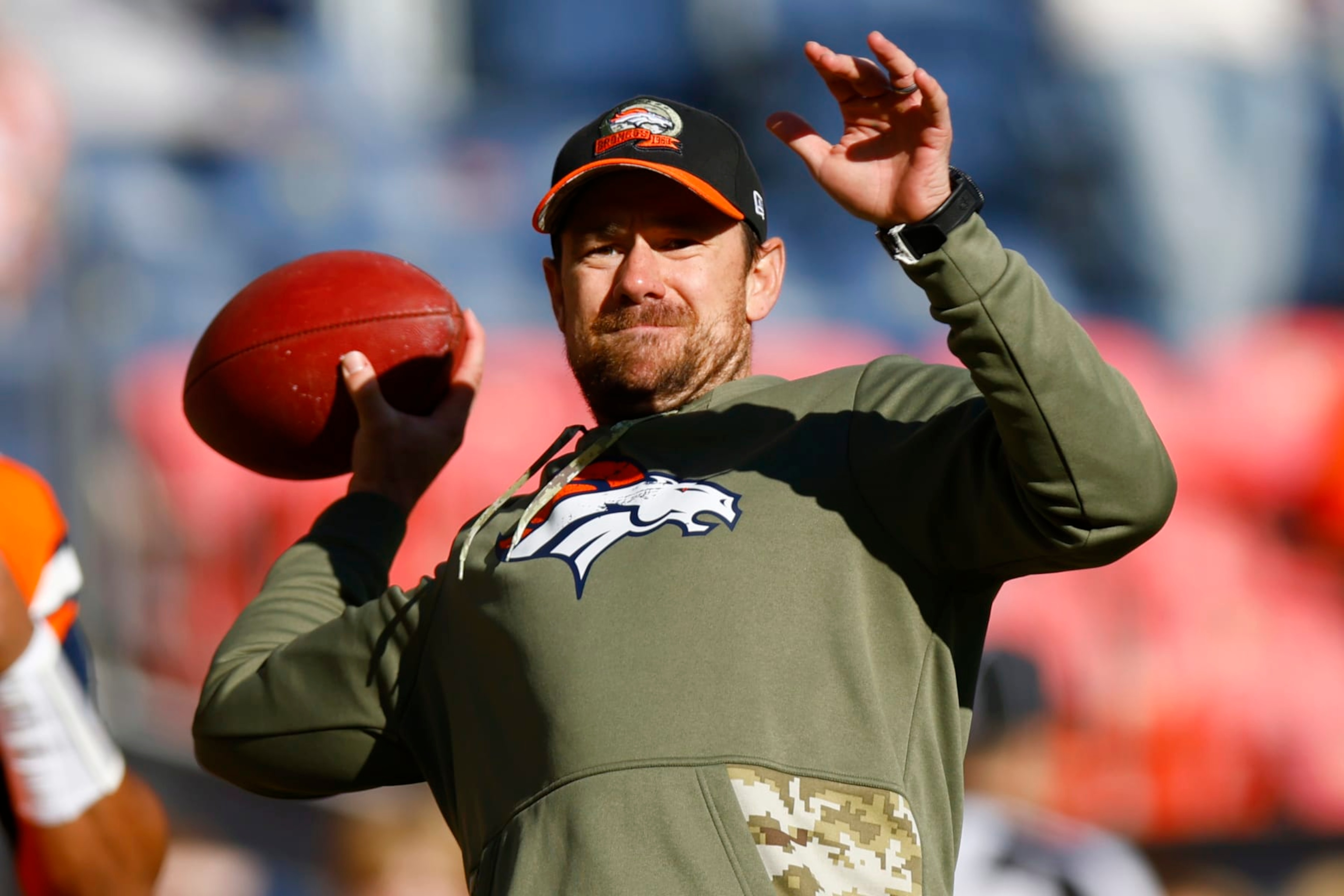 DENVER, COLORADO - NOVEMBER 20: Klint Kubiak quarterbacks coach for the Denver Broncos throws a pass during warmups prior to a game against the Las Vegas Raiders at Empower Field At Mile High on November 20, 2022 in Denver, Colorado. (Photo by Justin Edmonds/Getty Images) DENVER, COLORADO - NOVEMBER 20: Klint Kubiak quarterbacks coach for the Denver Broncos throws a pass during warmups prior to a game against the Las Vegas Raiders at Empower Field At Mile High on November 20, 2022 in Denver, Colorado. (Photo by Justin Edmonds/Getty Images)