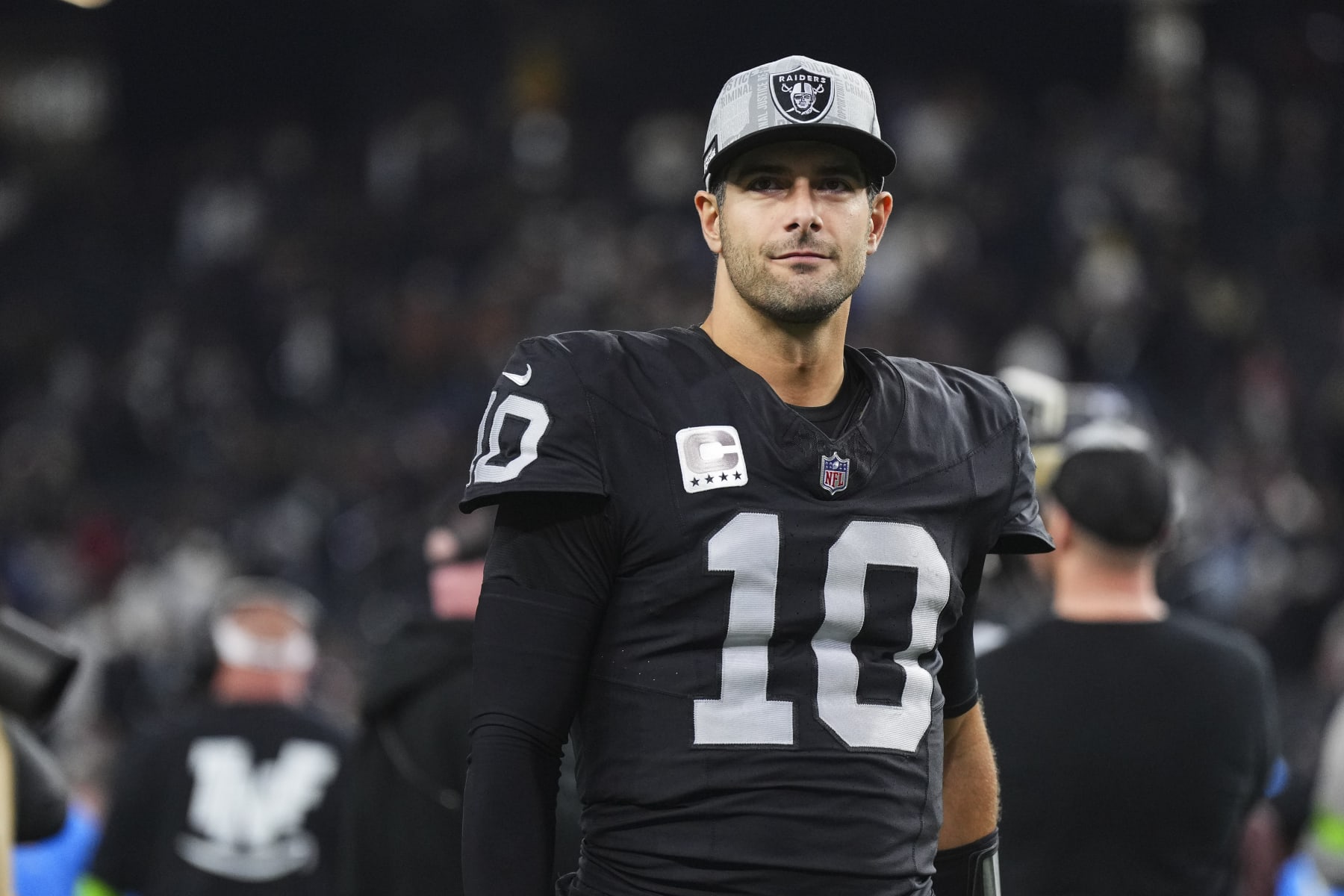 LAS VEGAS, NV - DECEMBER 14: Jimmy Garoppolo #10 of the Las Vegas Raiders walks off of the field after an NFL football game against the Los Angeles Chargers at Allegiant Stadium on December 14, 2023 in Las Vegas, Nevada. (Photo by Cooper Neill/Getty Images)