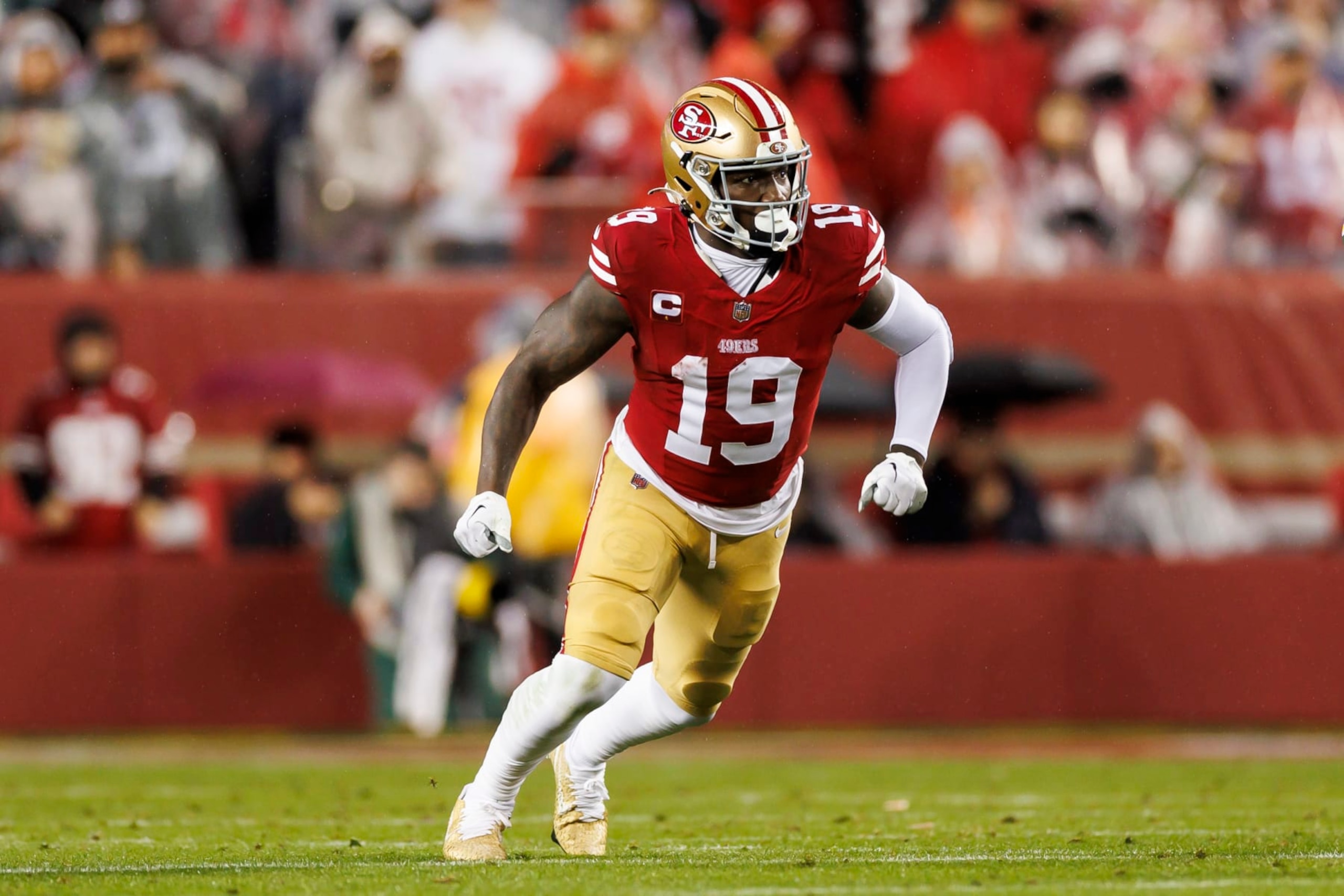 SANTA CLARA, CALIFORNIA - JANUARY 20: Deebo Samuel #19 of the San Francisco 49ers runs a route during an NFC divisional round playoff football game against the Green Bay Packers at Levi's Stadium on January 20, 2024 in Santa Clara, California. (Photo by Ryan Kang/Getty Images)