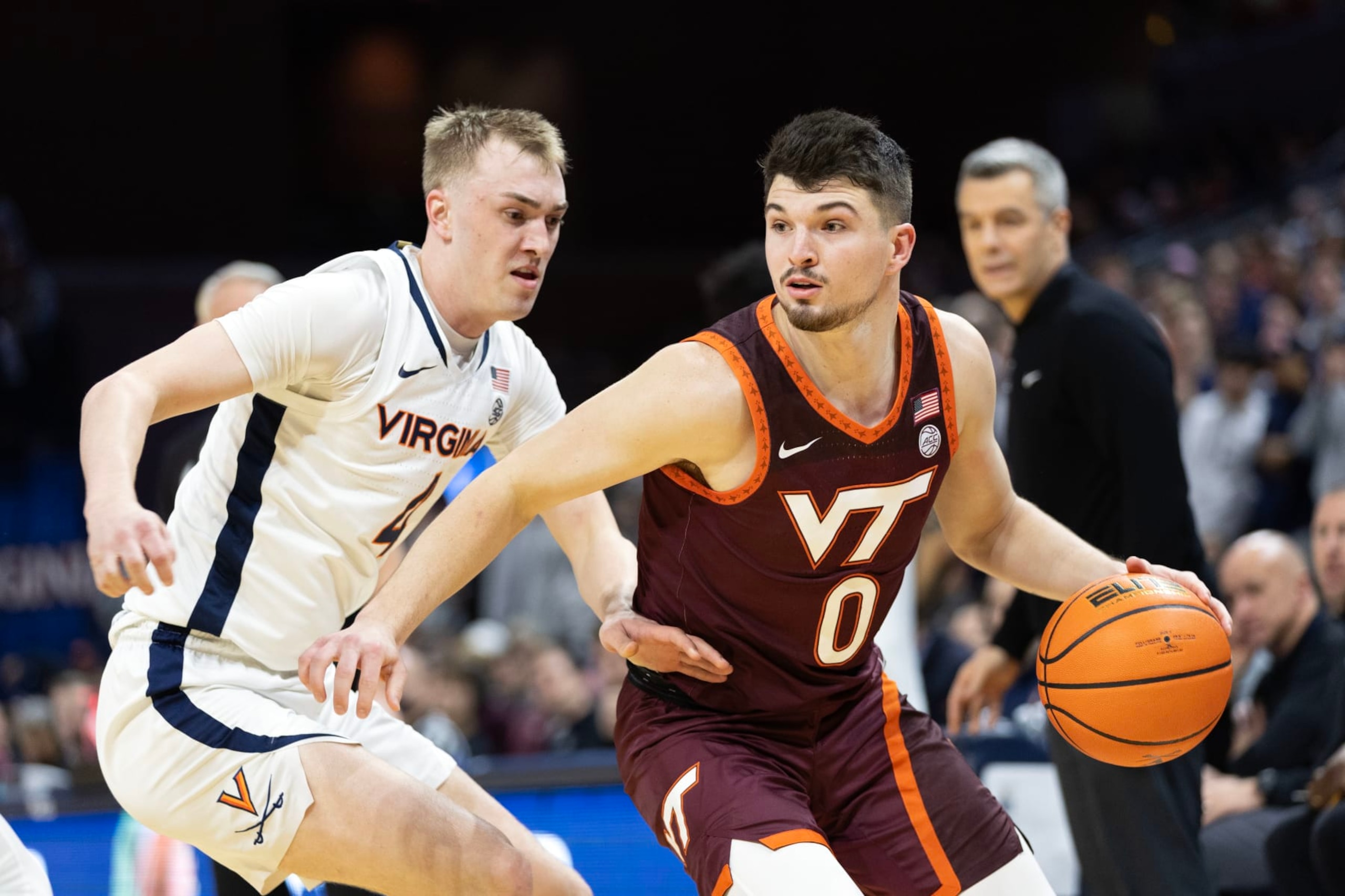 Virginia's Andrew Rohde and Virginia Tech's Hunter Cattoor