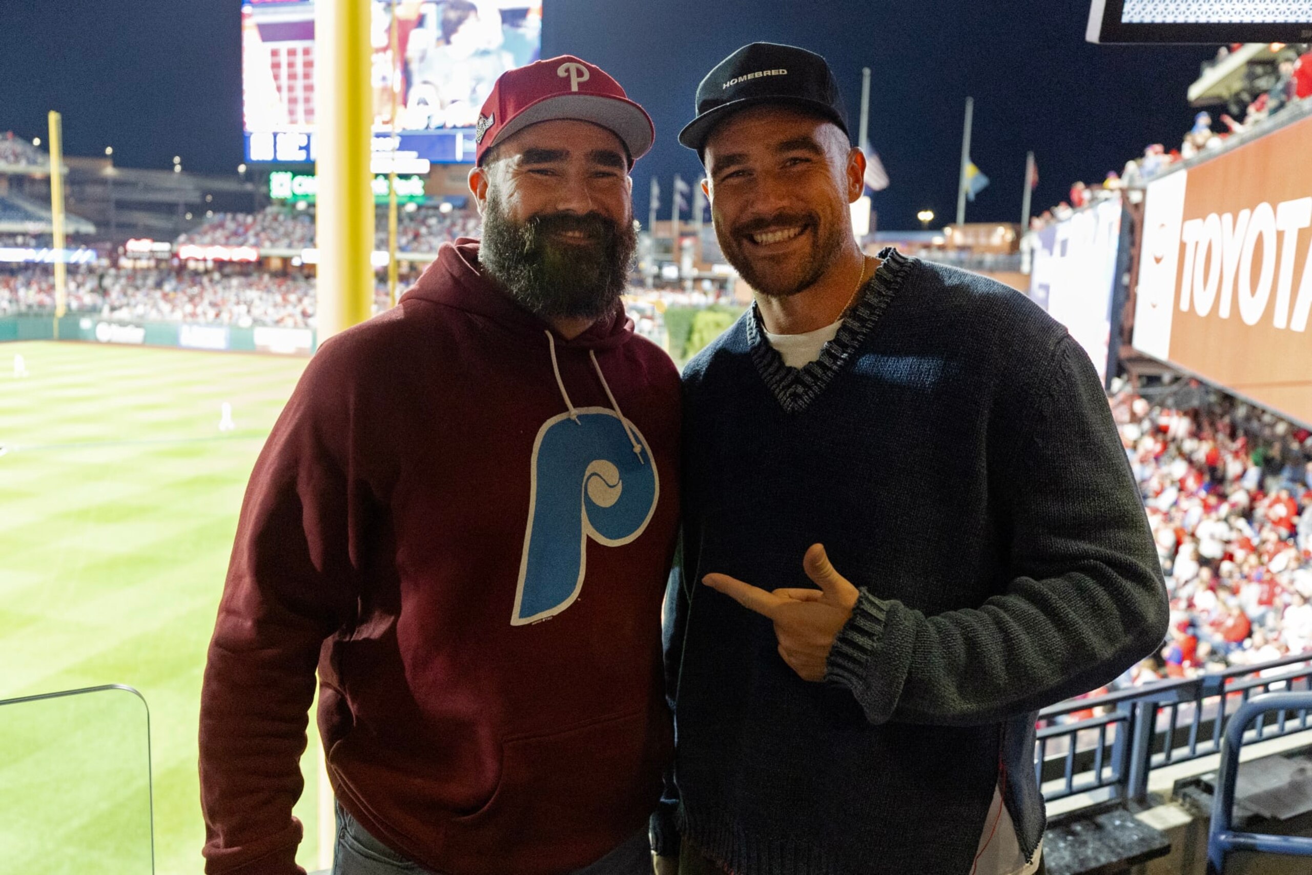 PHILADELPHIA, PA - OCTOBER 16:  Jason and Travis Kelce pose for a photo during Game 1 of the NLCS between the Arizona Diamondbacks and the Philadelphia Phillies at Citizens Bank Park on Monday, October 16, 2023 in Philadelphia, Pennsylvania. (Photo by Gabriella Ricciardi/MLB Photos via Getty Images)