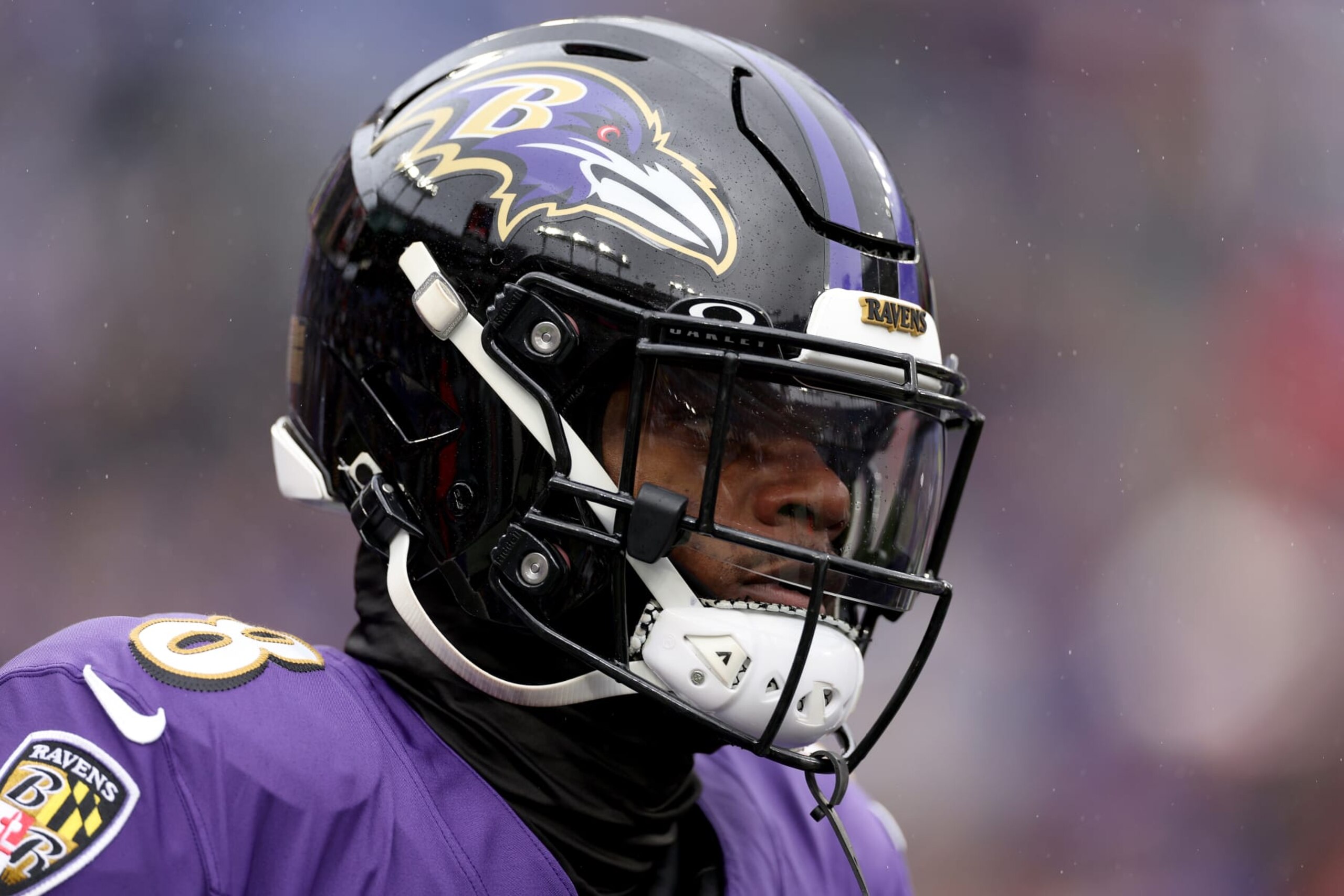 BALTIMORE, MARYLAND - JANUARY 28: Lamar Jackson #8 of the Baltimore Ravens warms up prior to the AFC Championship Game against the Kansas City Chiefs at M&T Bank Stadium on January 28, 2024 in Baltimore, Maryland. (Photo by Patrick Smith/Getty Images)