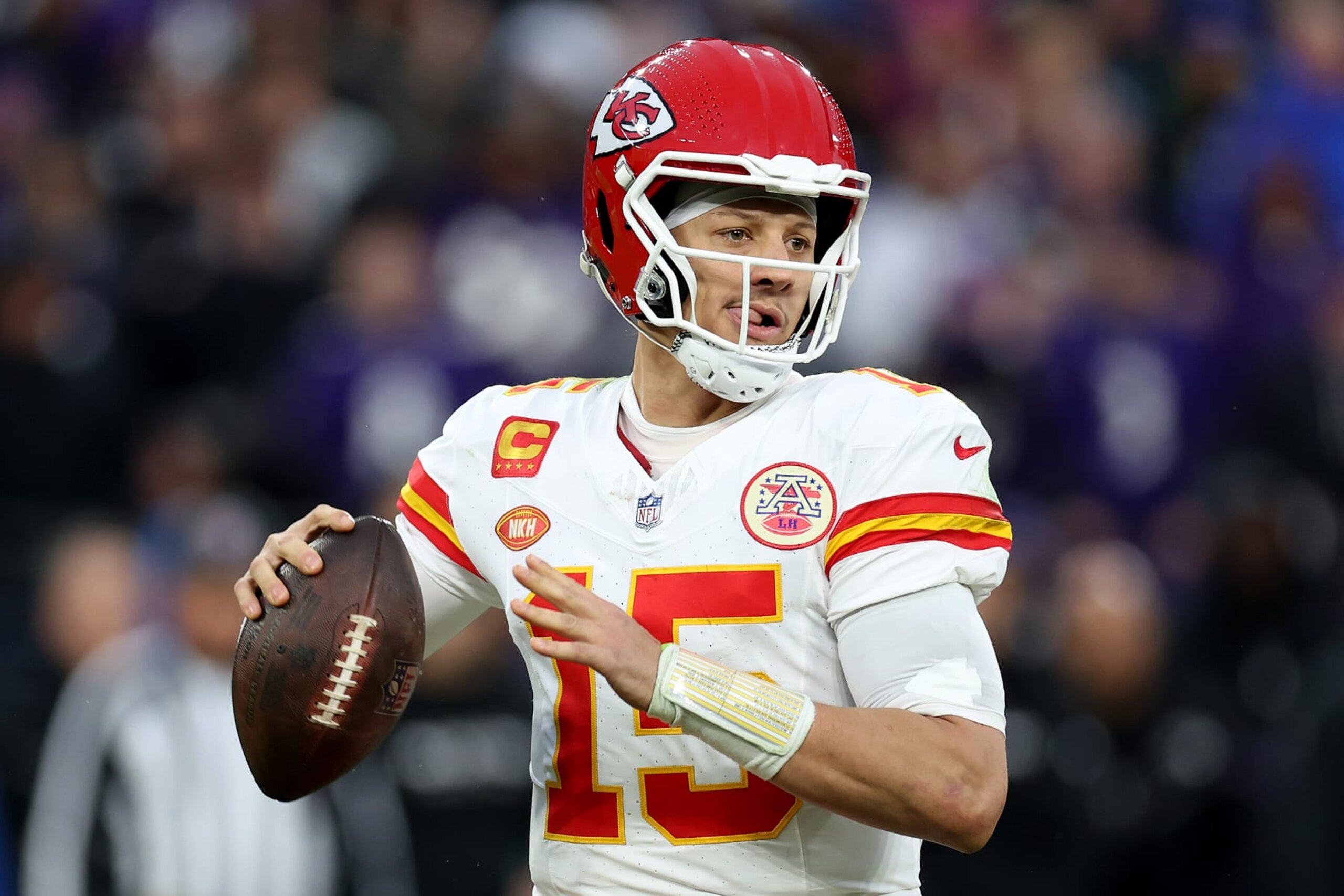 BALTIMORE, MARYLAND - JANUARY 28: Patrick Mahomes #15 of the Kansas City Chiefs looks to pass against the Baltimore Ravens during the second quarter in the AFC Championship Game at M&T Bank Stadium on January 28, 2024 in Baltimore, Maryland. (Photo by Rob Carr/Getty Images)