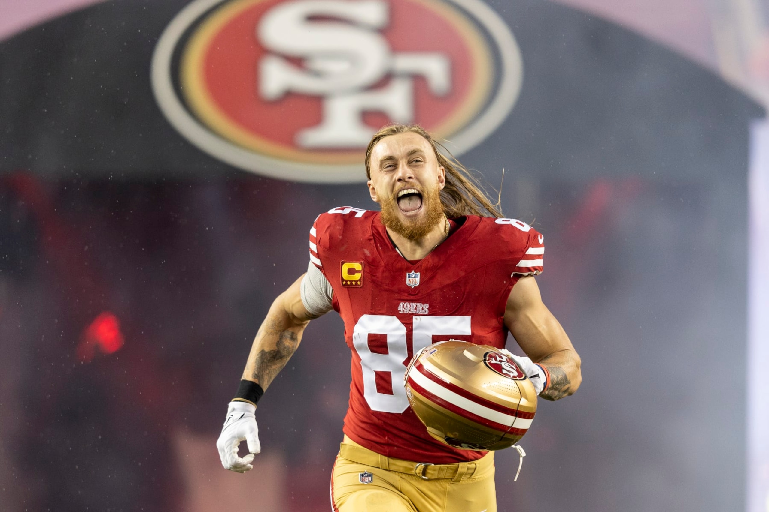SANTA CLARA, CALIFORNIA - JANUARY 20: George Kittle #85 of the San Francisco 49ers reacts as he takes the field prior to an NFL divisional round playoff football game between the San Francisco 49ers and the Green Bay Packers at Levi's Stadium on January 20, 2024 in Santa Clara, California. (Photo by Michael Owens/Getty Images)