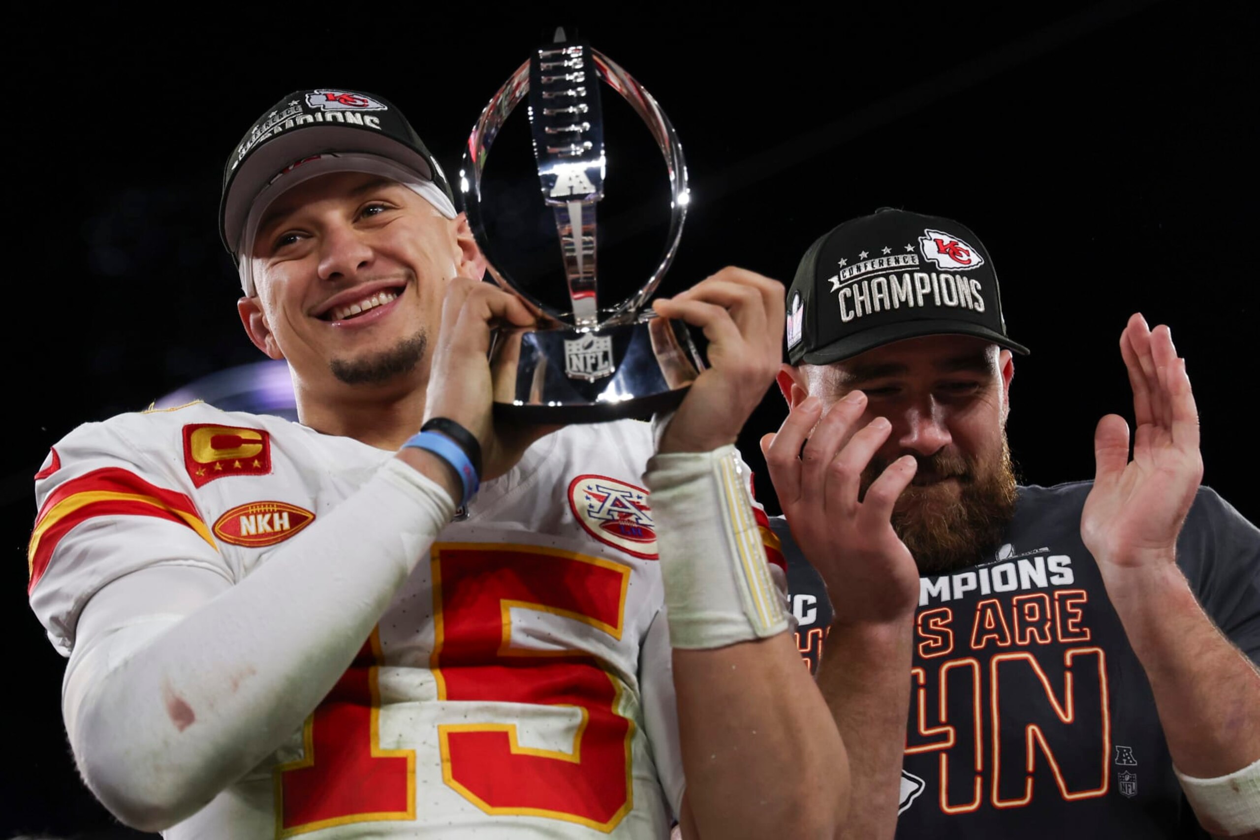 BALTIMORE, MARYLAND - JANUARY 28: Patrick Mahomes #15 of the Kansas City Chiefs holds the Lamar Hunt Trophy with Travis Kelce #87  after the AFC championship game against the Baltimore Ravens at M&T Bank Stadium on January 28, 2024 in Baltimore, Maryland. (Photo by Kara Durrette/Getty Images)