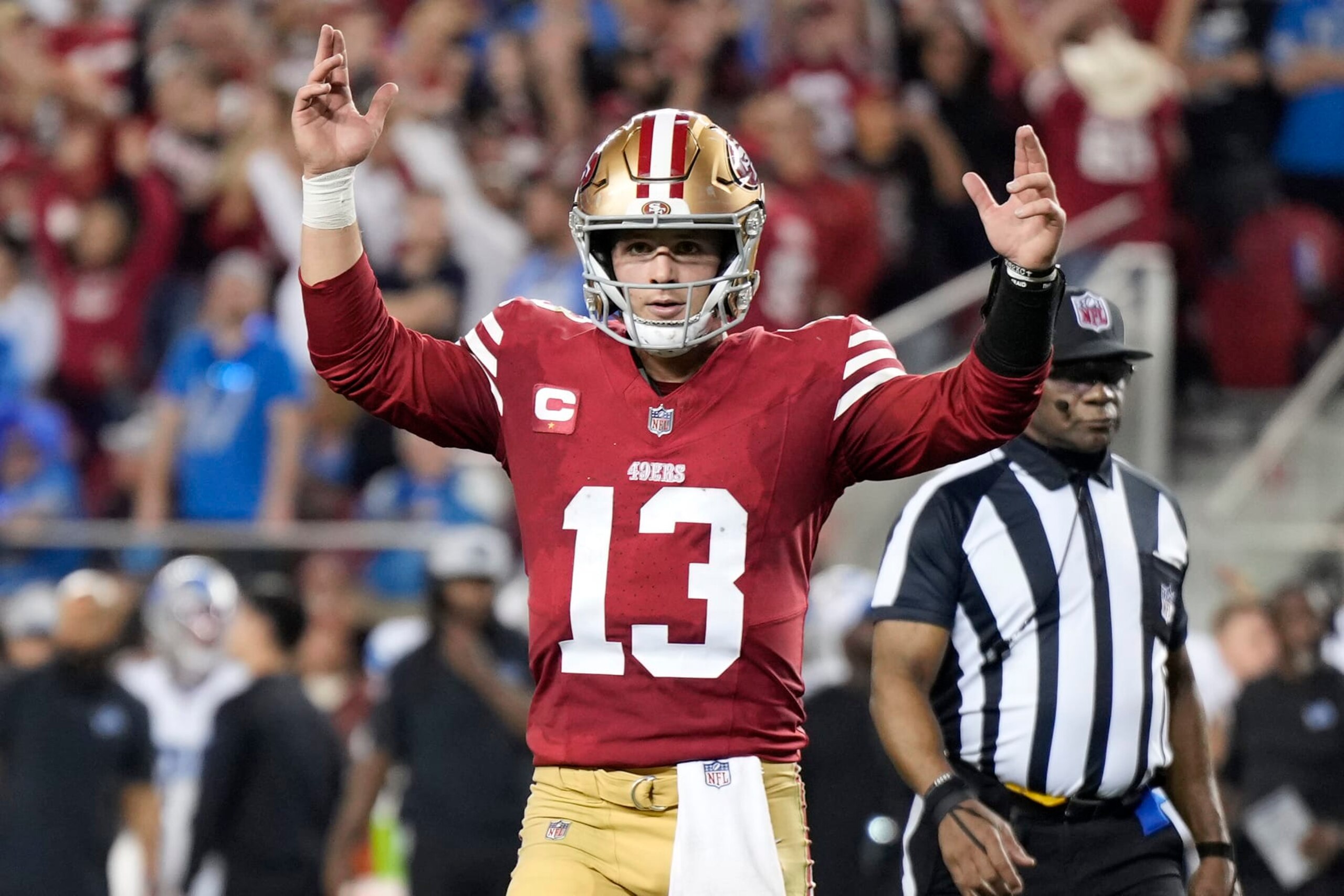 SANTA CLARA, CALIFORNIA - JANUARY 28: Brock Purdy #13 of the San Francisco 49ers reacts after a touchdown during the fourth quarter against the Detroit Lions in the NFC Championship Game at Levi's Stadium on January 28, 2024 in Santa Clara, California. (Photo by Thearon W. Henderson/Getty Images)