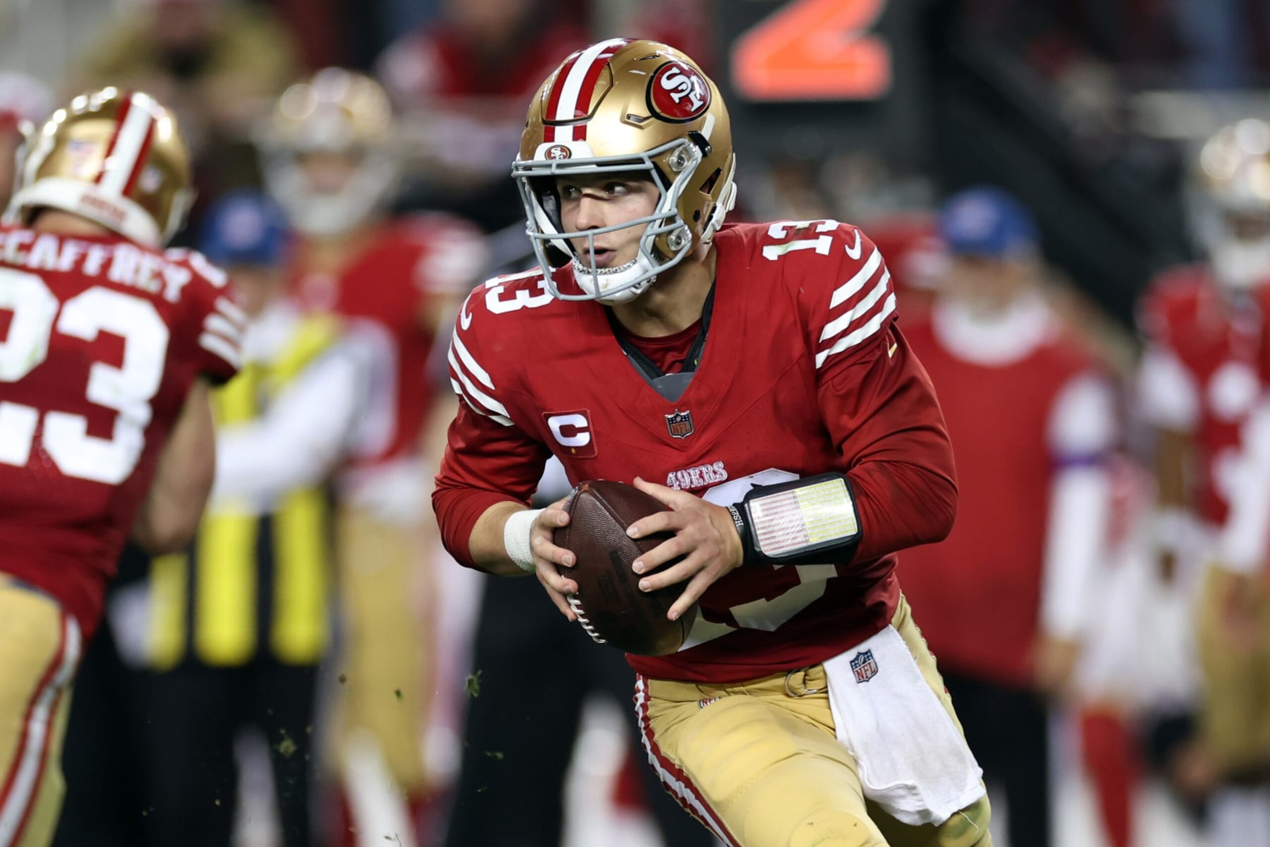 SANTA CLARA, CALIFORNIA - JANUARY 28: Brock Purdy #13 of the San Francisco 49ers looks to throw the ball during the fourth quarter against the Detroit Lions in the NFC Championship Game at Levi's Stadium on January 28, 2024 in Santa Clara, California. (Photo by Ezra Shaw/Getty Images)