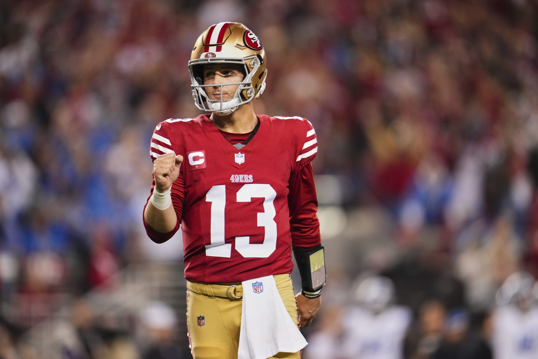 SANTA CLARA, CA - JANUARY 28: Brock Purdy #13 of the San Francisco 49ers celebrates after scoring a touchdown against the Detroit Lions during the second half of the NFC Championship football game at Levi's Stadium on January 28, 2024 in Santa Clara, California. (Photo by Cooper Neill/Getty Images)