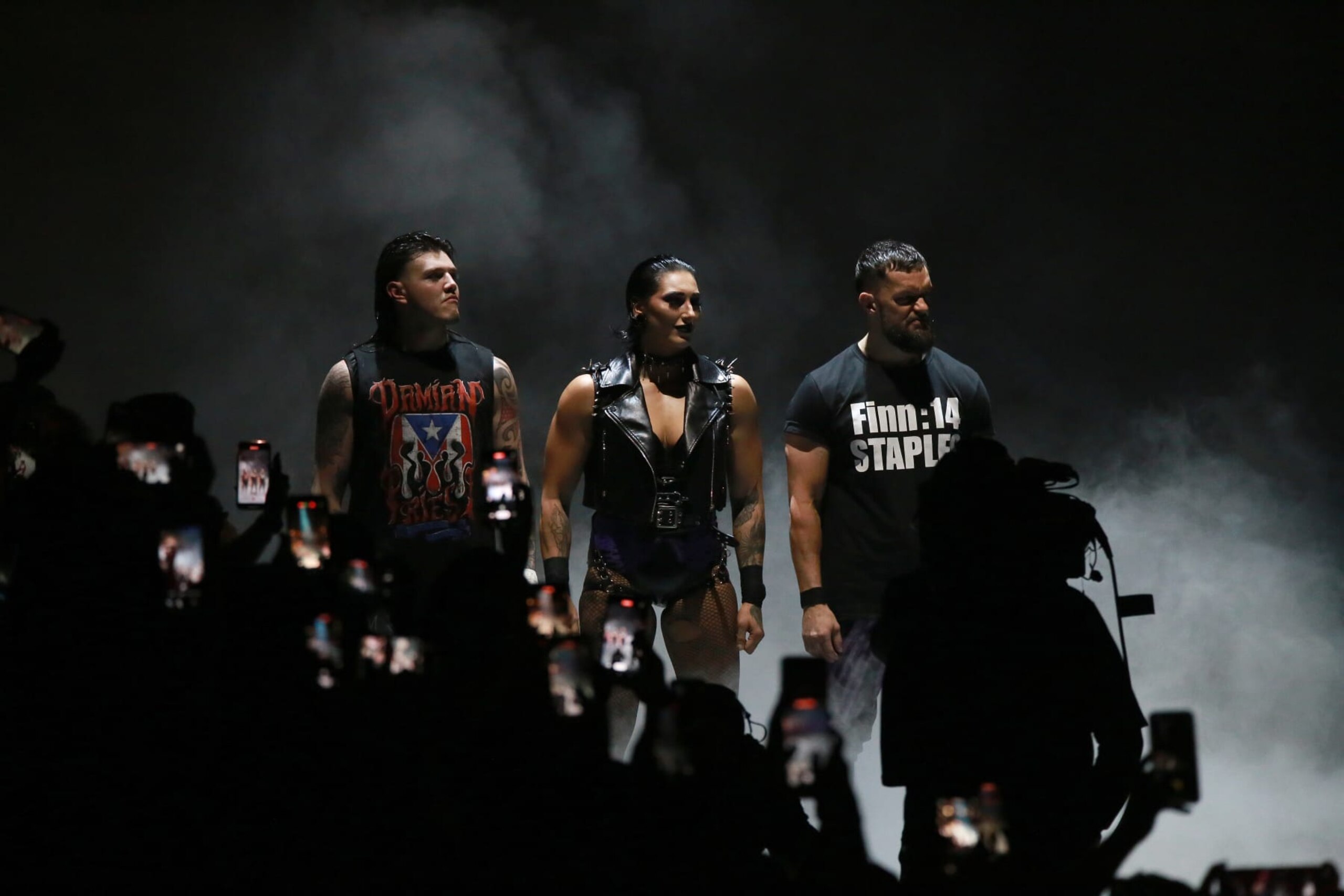 SAN JUAN, PUERTO RICO - MAY 05: Rhea Ripley and Dominik Mysterio enter the ring during the WWE SmackDown at Coliseo de Puerto Rico José Miguel Agrelot on May 05, 2023 in San Juan, Puerto Rico. (Photo by Gladys Vega/Getty Images) SAN JUAN, PUERTO RICO - MAY 05: Rhea Ripley and Dominik Mysterio enter the ring during the WWE SmackDown at Coliseo de Puerto Rico José Miguel Agrelot on May 05, 2023 in San Juan, Puerto Rico. (Photo by Gladys Vega/Getty Images)