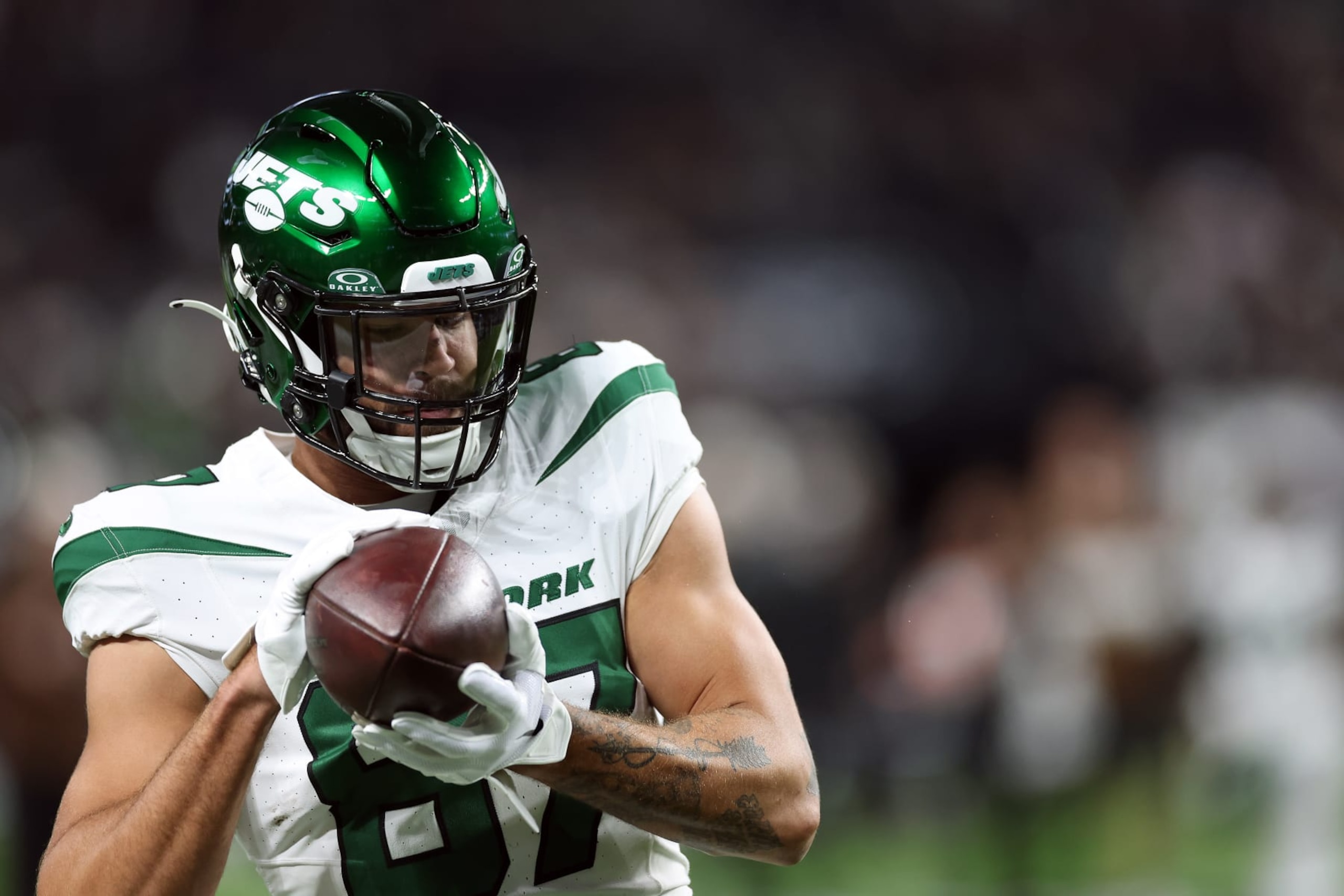 LAS VEGAS, NEVADA - NOVEMBER 12:  Tight end C.J. Uzomah #87 of the New York Jets warms up prior to the game against the Las Vegas Raiders at Allegiant Stadium on November 12, 2023 in Las Vegas, Nevada. (Photo by Sean M. Haffey/Getty Images)