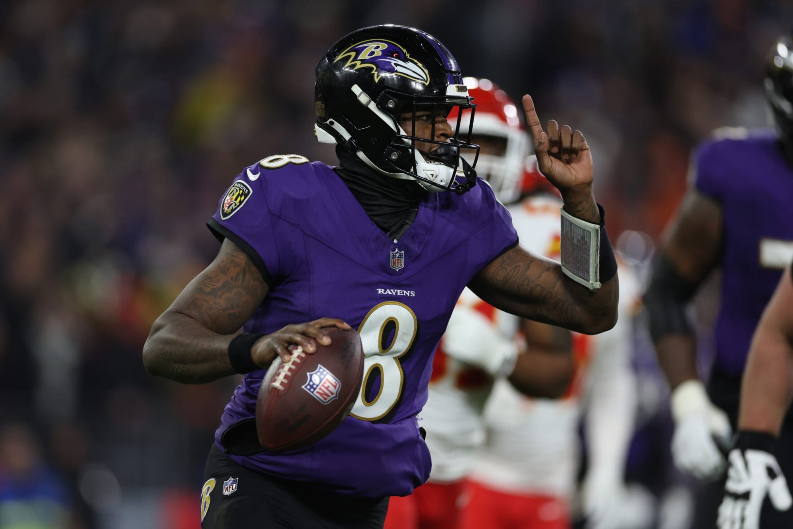 BALTIMORE, MARYLAND - JANUARY 28: Lamar Jackson #8 of the Baltimore Ravens looks to pass against the Kansas City Chiefs during the fourth quarter in the AFC Championship Game at M&T Bank Stadium on January 28, 2024 in Baltimore, Maryland. (Photo by Patrick Smith/Getty Images)