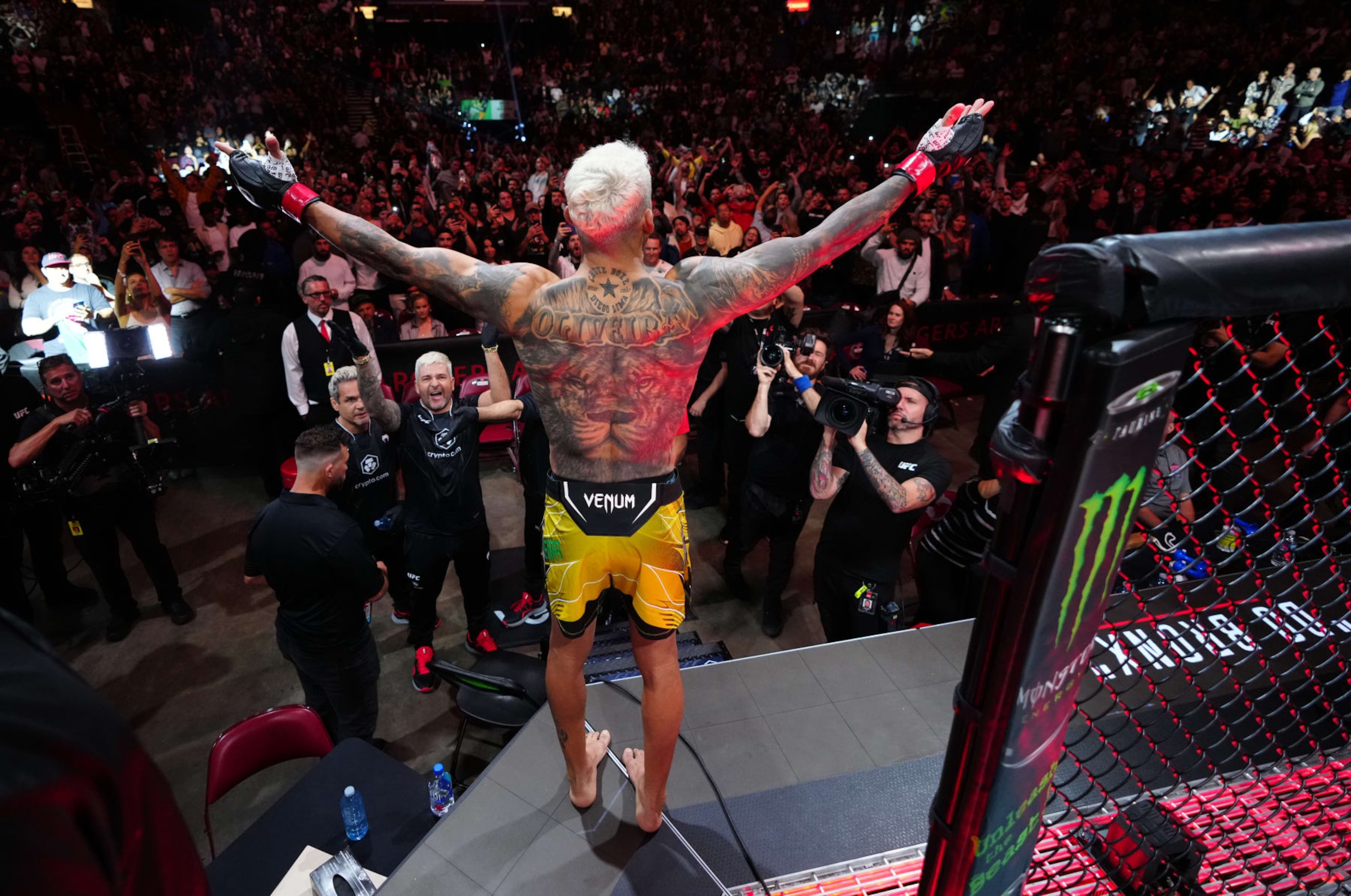 Charles Oliveira enters the Octagon