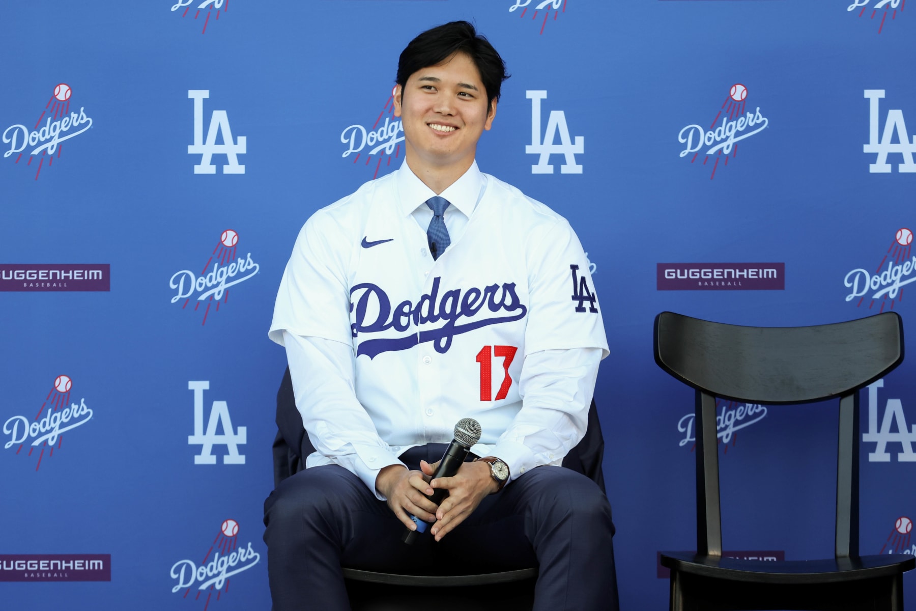 LOS ANGELES, CA - DECEMBER 14: Shohei Ohtani smiles as he answers questions during the Shohei Ohtani Los Angeles Dodgers Press Conference at Dodger Stadium on Thursday, December 14, 2023 in Los Angeles, California. (Photo by Rob Leiter/MLB Photos via Getty Images)