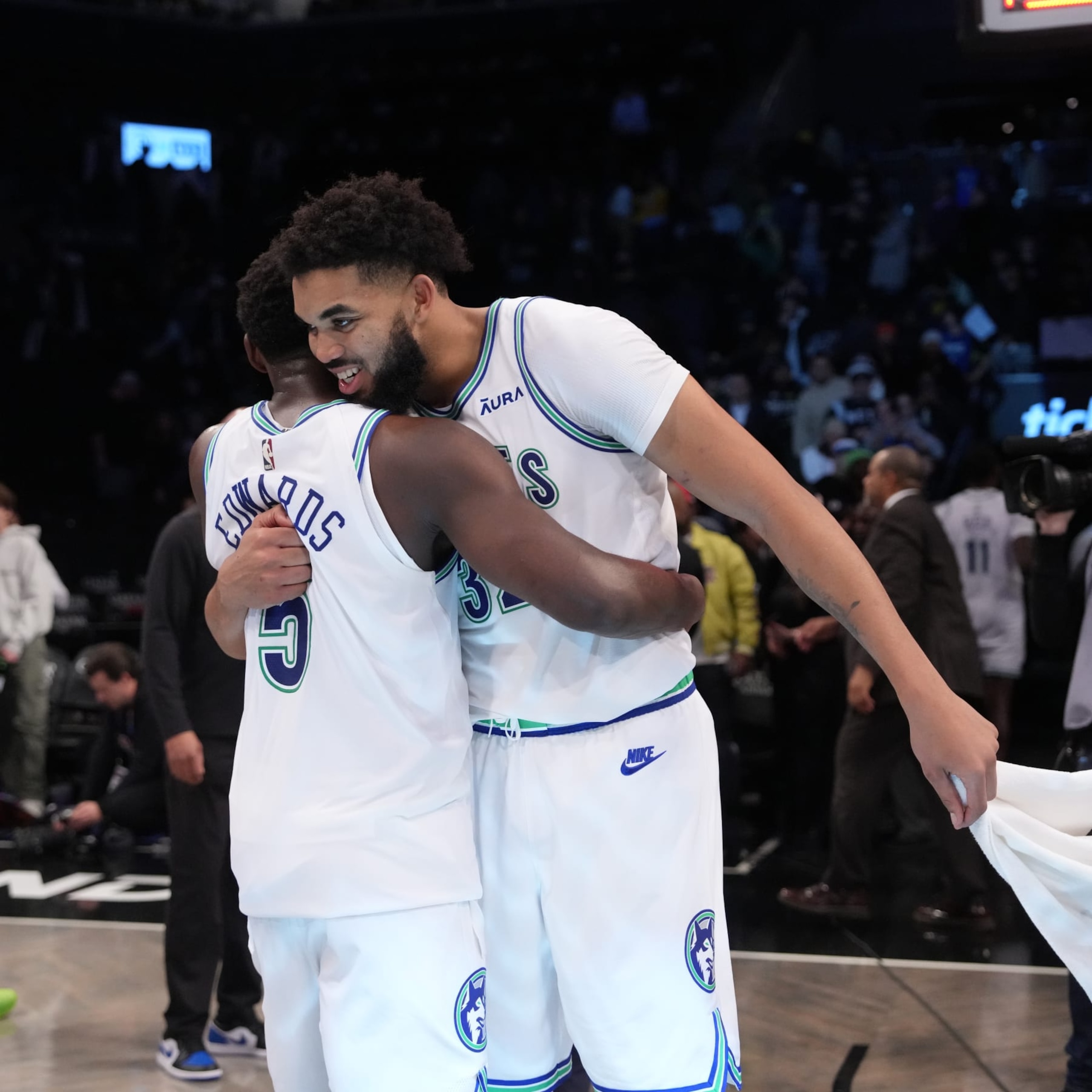 BROOKLYN, NY - JANUARY 25: Karl-Anthony Towns #32 hugs Anthony Edwards #5 of the Minnesota Timberwolves after the game against the Brooklyn Nets on January 25, 2024 at Barclays Center in Brooklyn, New York. NOTE TO USER: User expressly acknowledges and agrees that, by downloading and or using this Photograph, user is consenting to the terms and conditions of the Getty Images License Agreement. Mandatory Copyright Notice: Copyright 2024 NBAE (Photo by Jesse D. Garrabrant/NBAE via Getty Images)
