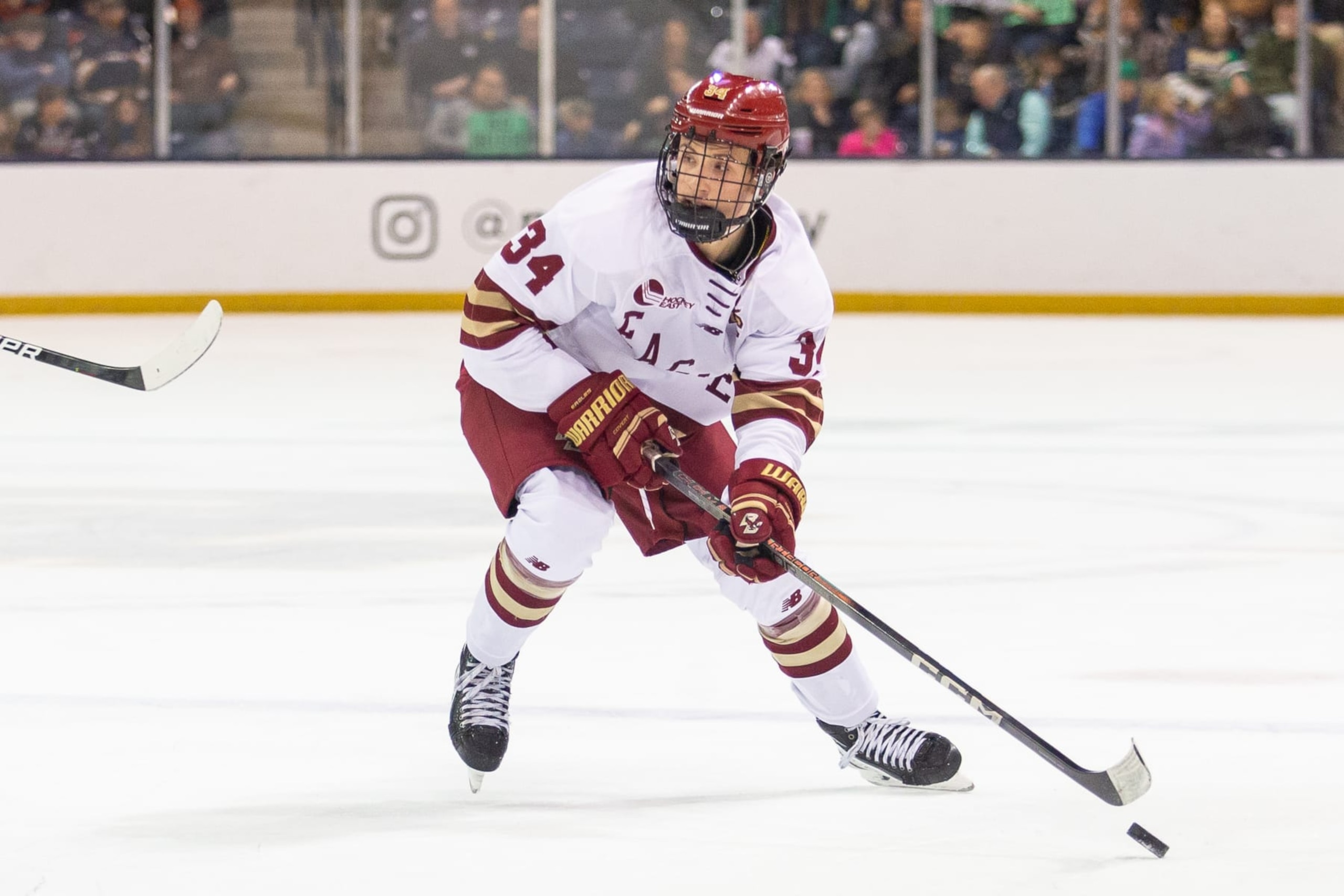 SOUTH BEND, IN - NOVEMBER 24: Gabe Perreault #34 of Boston College skates with the puck during a game between Boston College and Notre Dame at Compton Family Ice Arena on November 24, 2023 in South Bend, Indiana. (Photo by Michael Miller/ISI Photos/Getty Images)