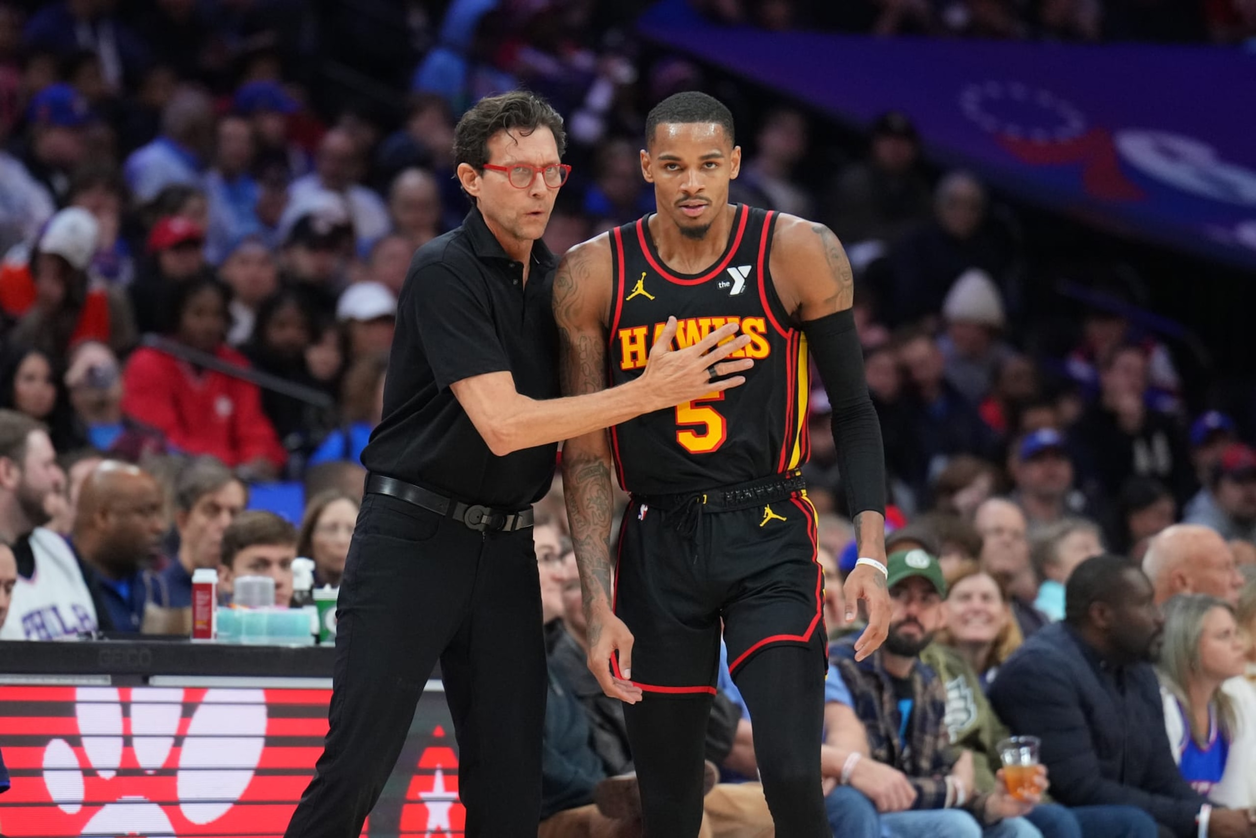 PHILADELPHIA, PA - DECEMBER 8: Dejounte Murray #5 and Head Coach Quin Snyder of the Atlanta Hawks talk during the game against the Philadelphia 76ers on December 8, 2023 at the Wells Fargo Center in Philadelphia, Pennsylvania NOTE TO USER: User expressly acknowledges and agrees that, by downloading and/or using this Photograph, user is consenting to the terms and conditions of the Getty Images License Agreement. Mandatory Copyright Notice: Copyright 2023 NBAE (Photo by Jesse D. Garrabrant/NBAE via Getty Images) PHILADELPHIA, PA - DECEMBER 8: Dejounte Murray #5 and Head Coach Quin Snyder of the Atlanta Hawks talk during the game against the Philadelphia 76ers on December 8, 2023 at the Wells Fargo Center in Philadelphia, Pennsylvania NOTE TO USER: User expressly acknowledges and agrees that, by downloading and/or using this Photograph, user is consenting to the terms and conditions of the Getty Images License Agreement. Mandatory Copyright Notice: Copyright 2023 NBAE (Photo by Jesse D. Garrabrant/NBAE via Getty Images)