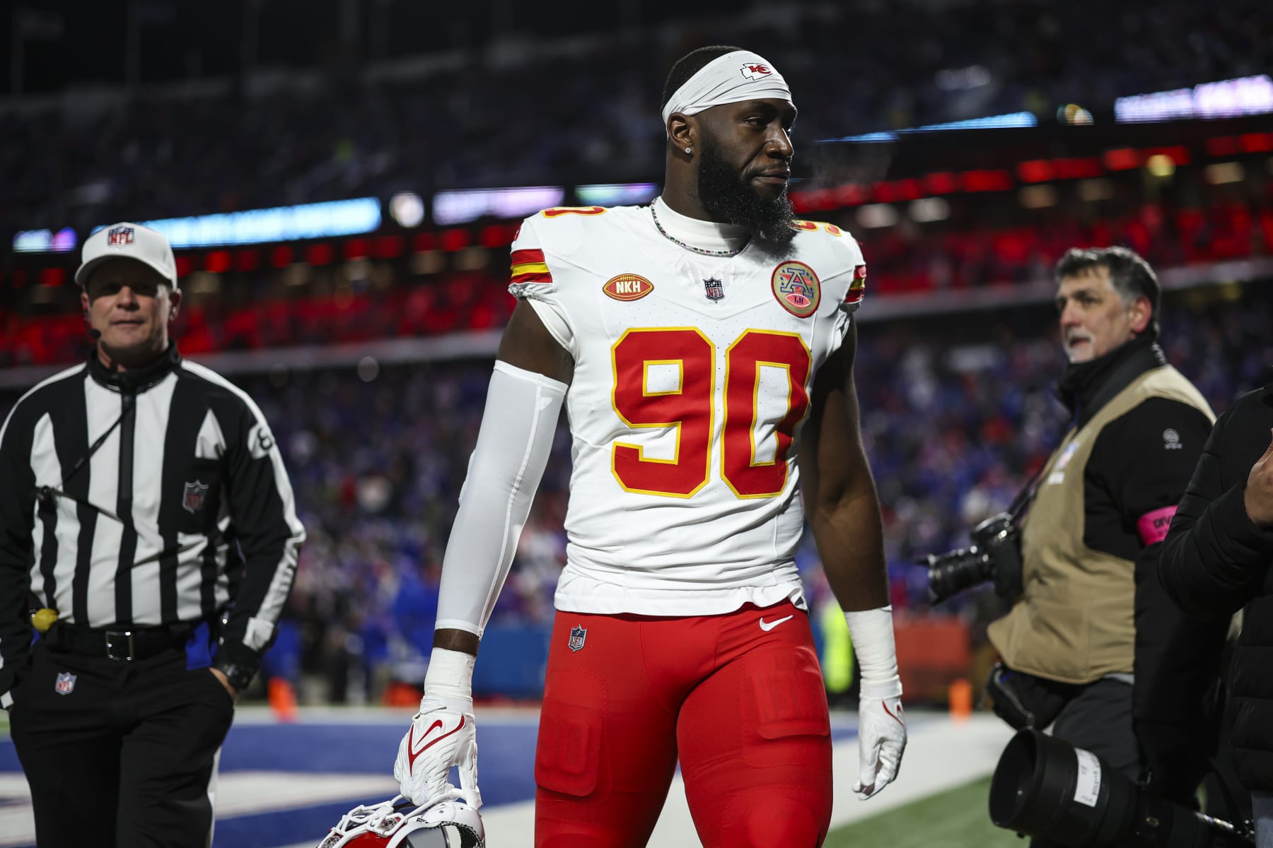 ORCHARD PARK, NY - JANUARY 21: Charles Omenihu #90 of the Kansas City Chiefs walks off of the field after warmups prior to an NFL divisional round playoff football game against the Buffalo Bills at Highmark Stadium on January 21, 2024 in Orchard Park, New York. (Photo by Perry Knotts/Getty Images)
